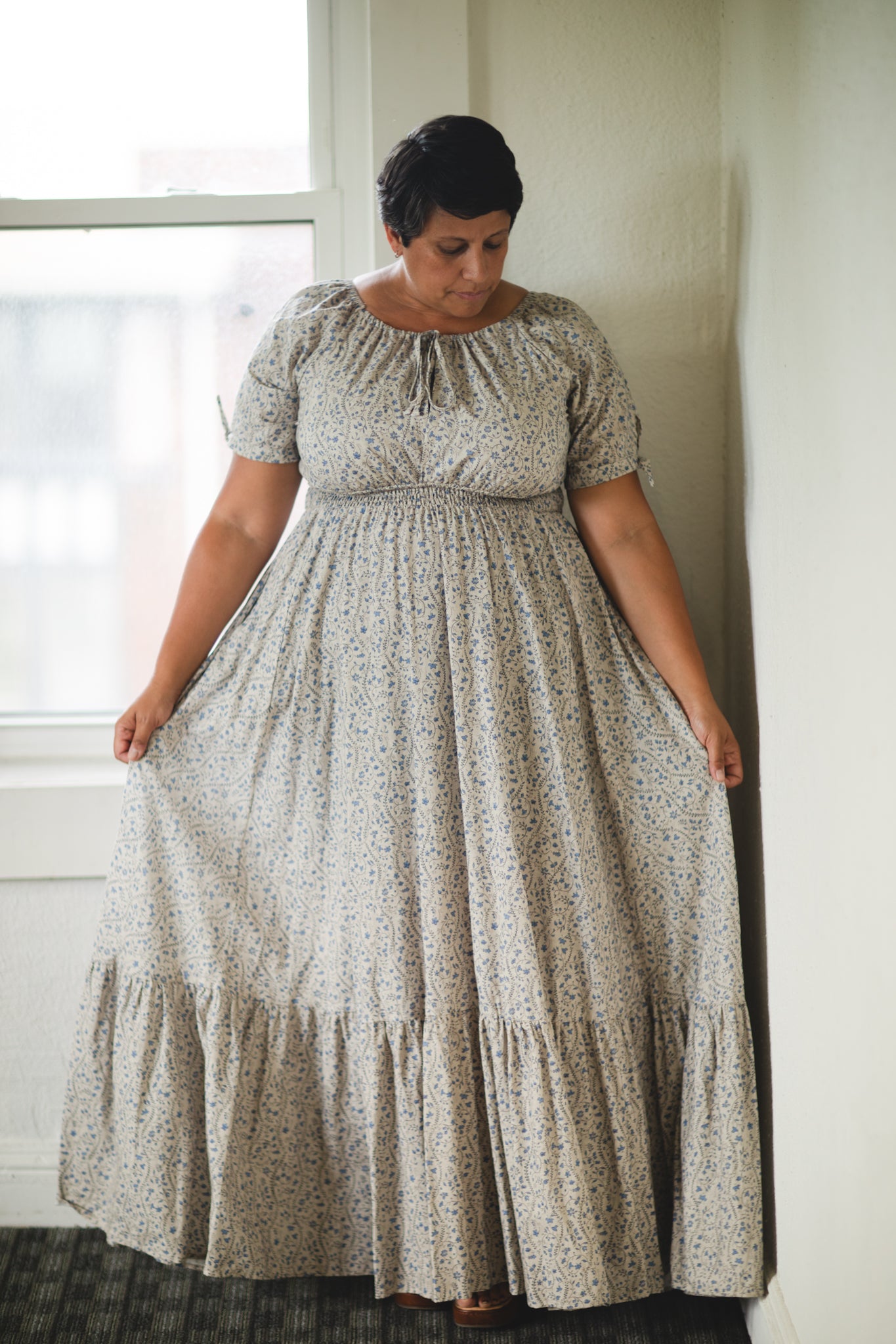woman in patterned modest nursing dress