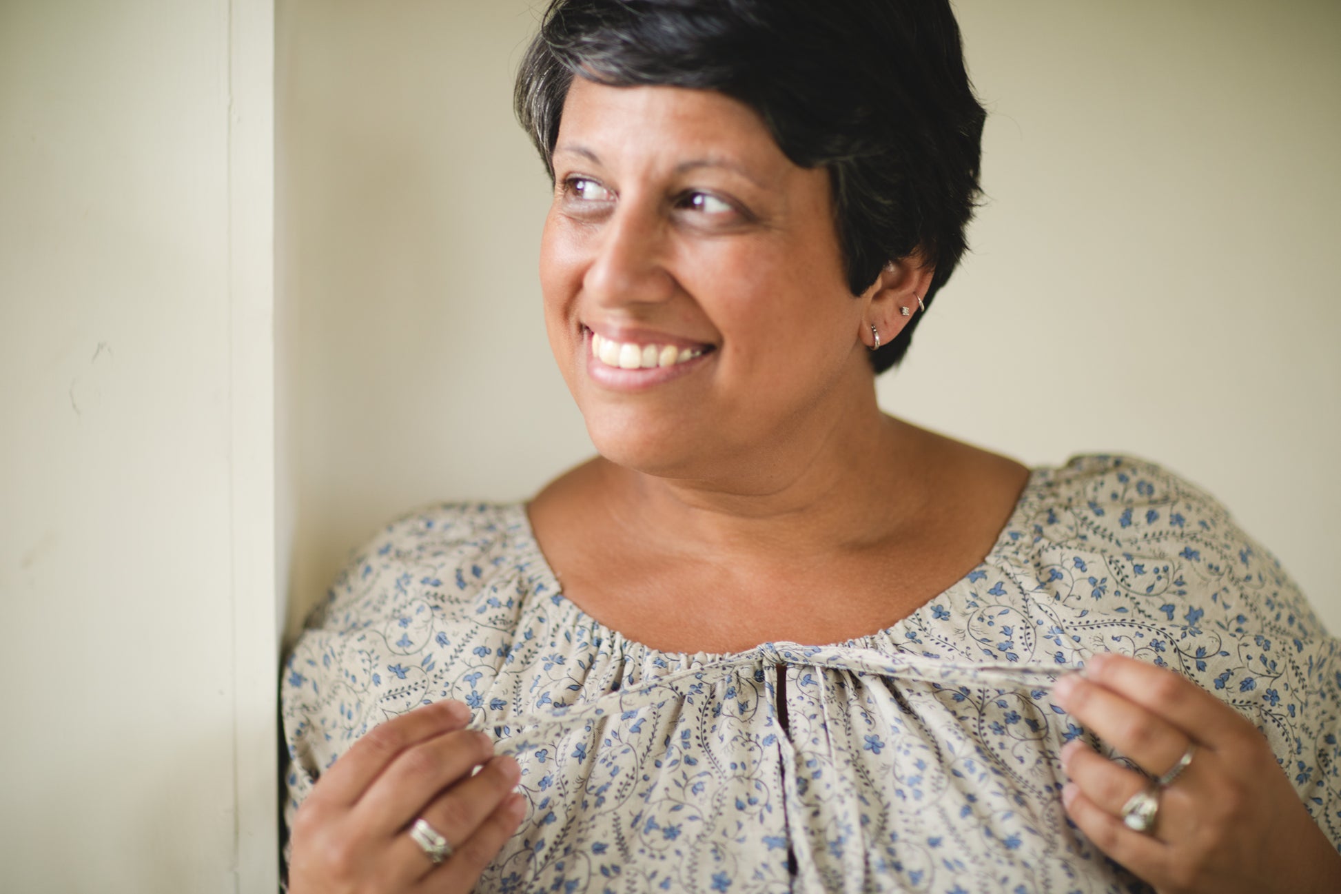 woman in patterned modest nursing dress