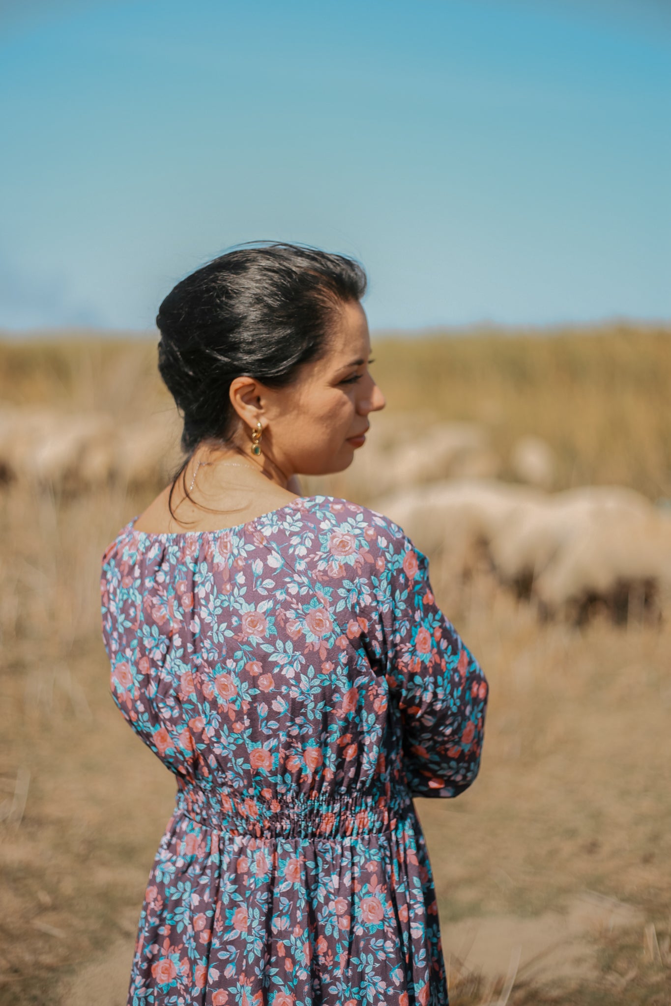 Woman in modest nursing floral dress