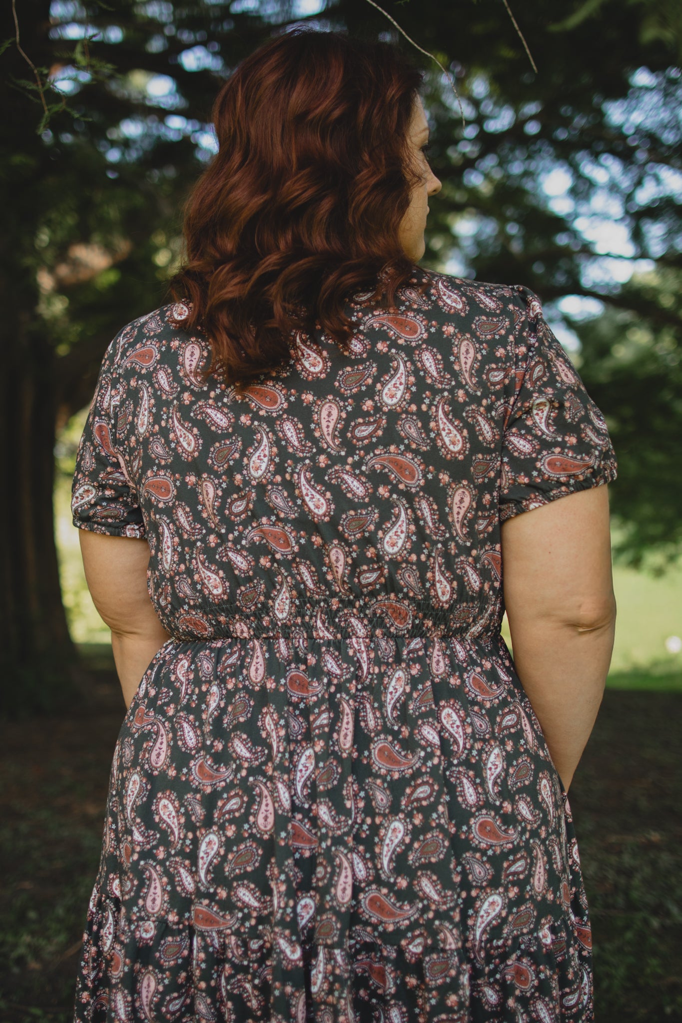 woman wearing a modest nursing floral dress