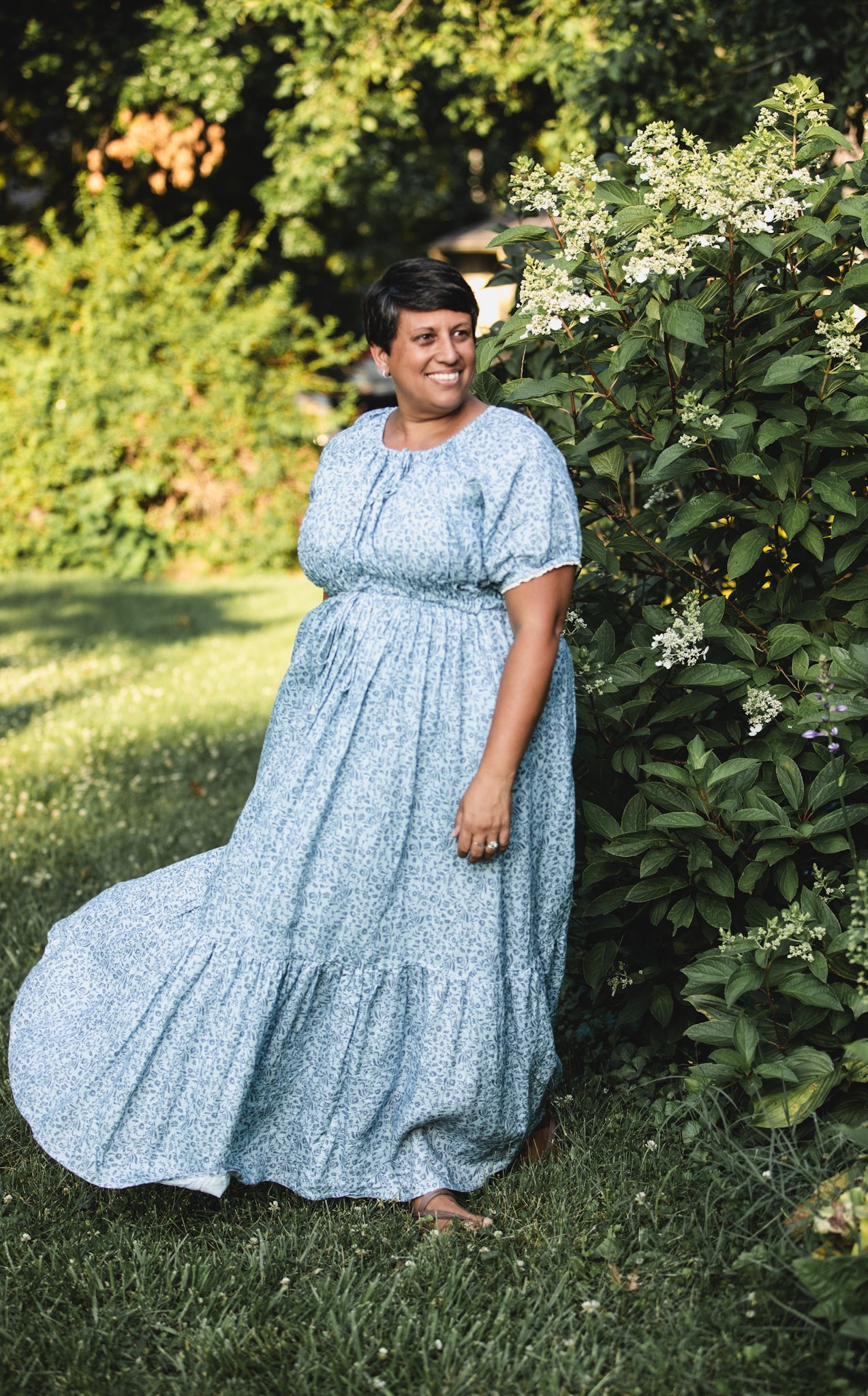 woman in a modest blue nursing dress