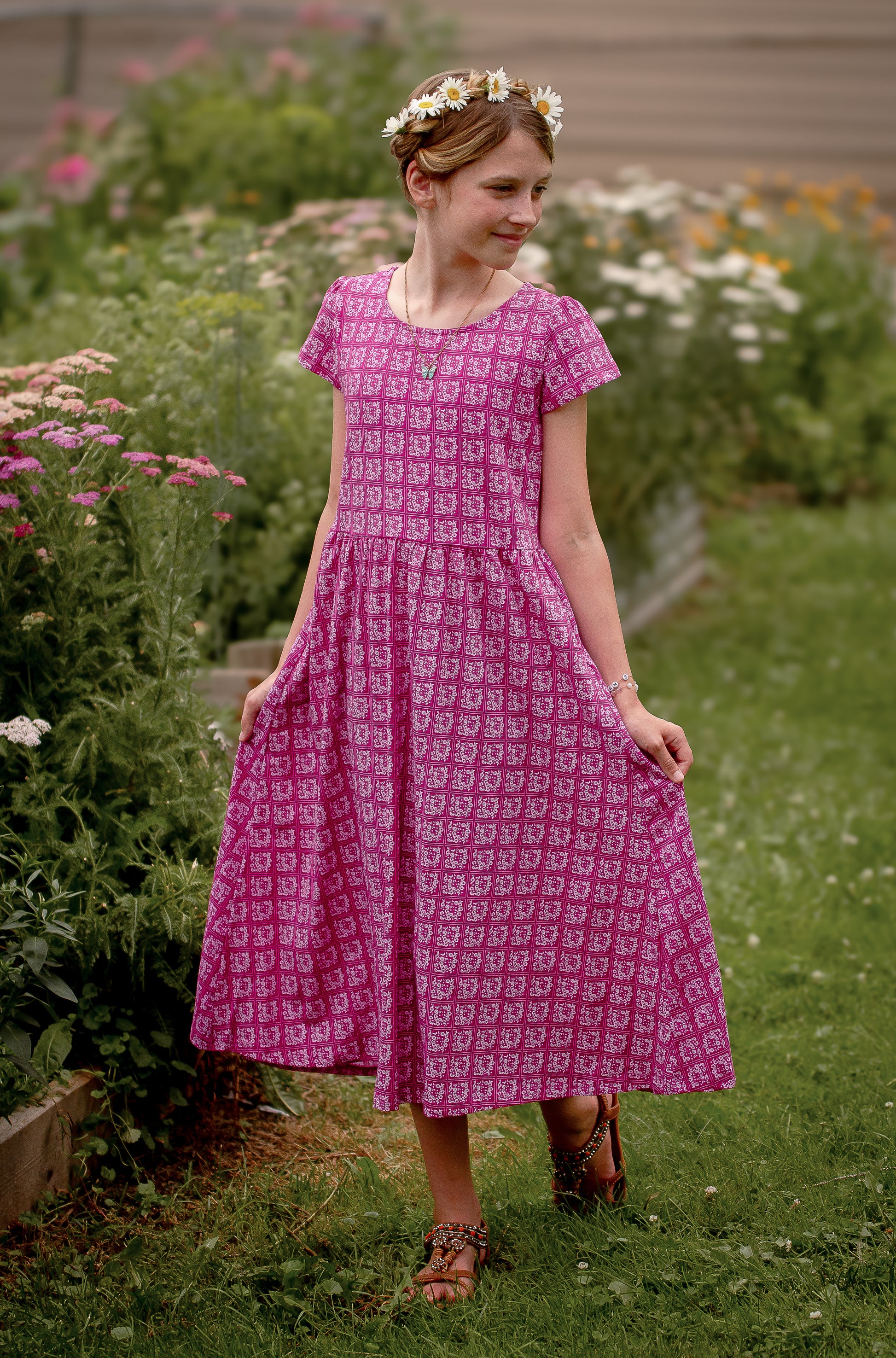 Young girl in a modest pink dress
