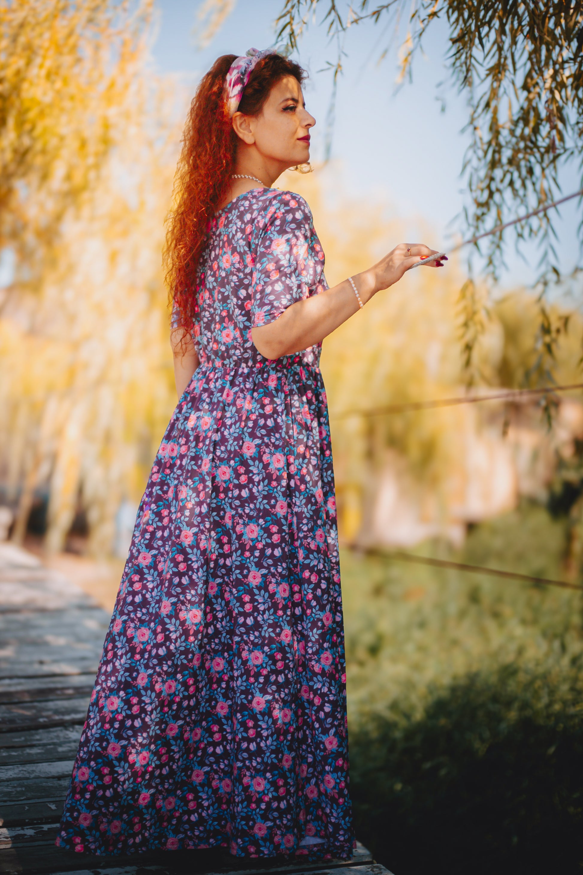 woman wearing a modest nursing floral dress