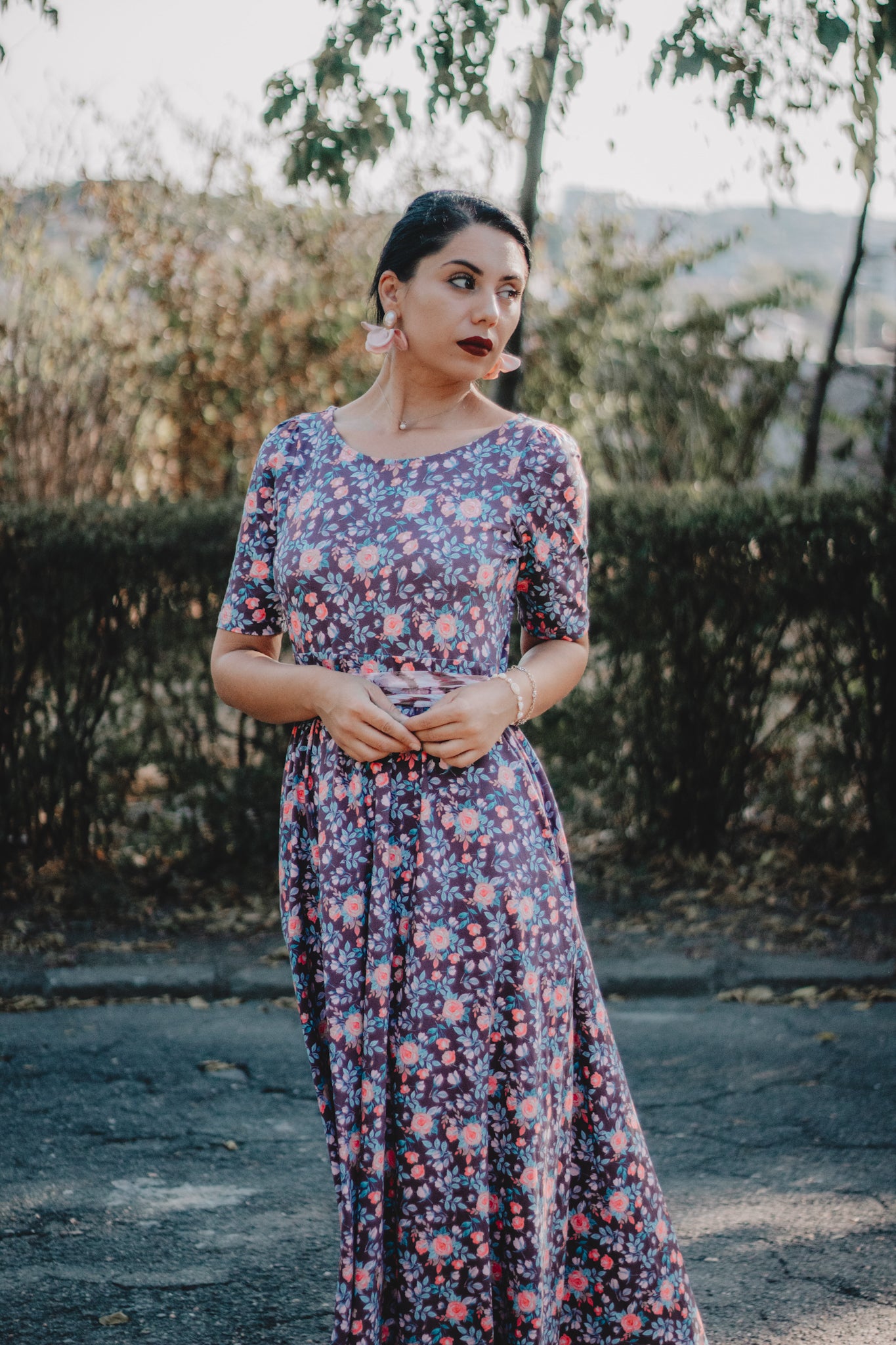 woman wearing a modest nursing floral dress