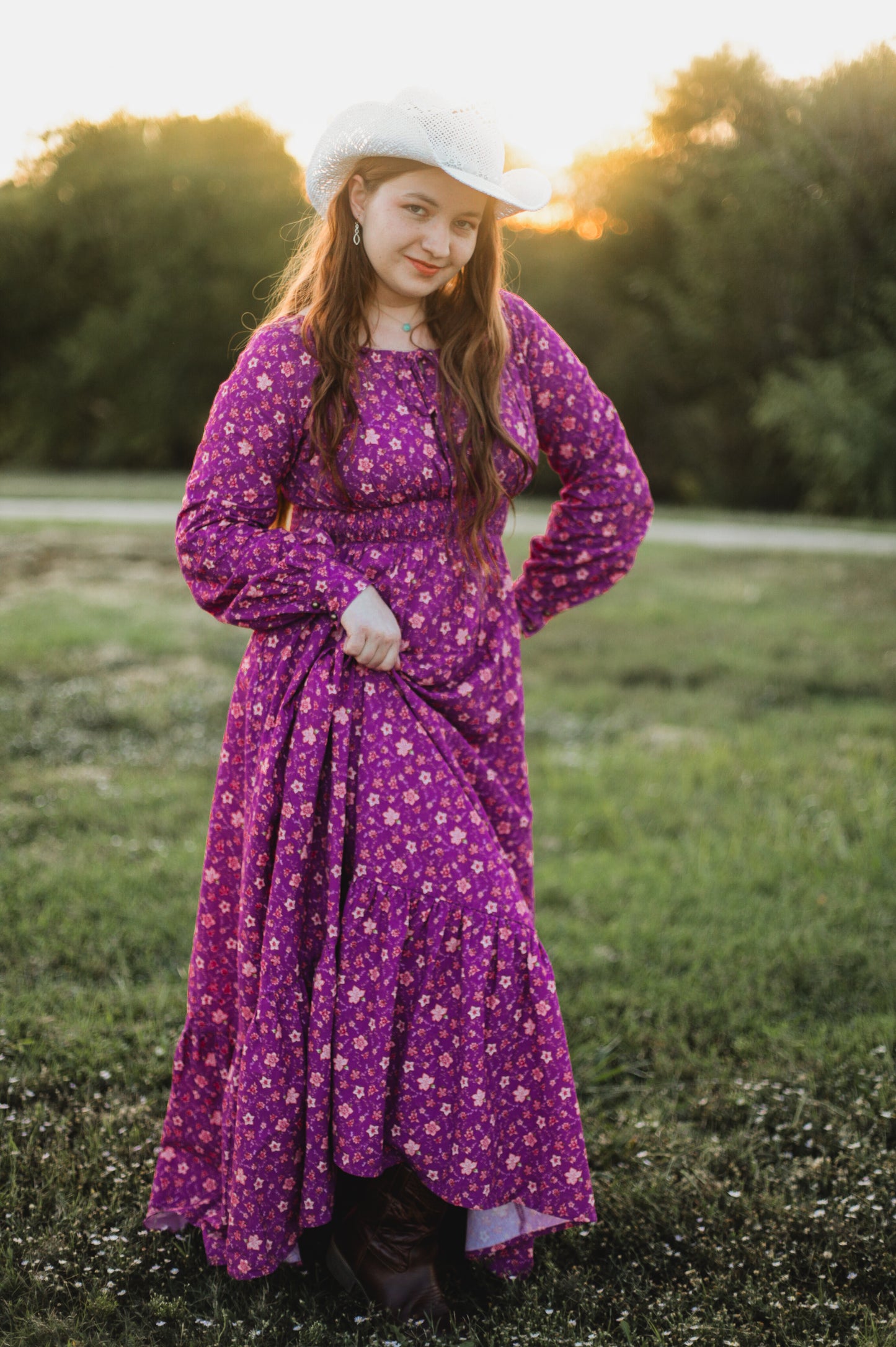 Woman in modest purple nursing dress outdoors