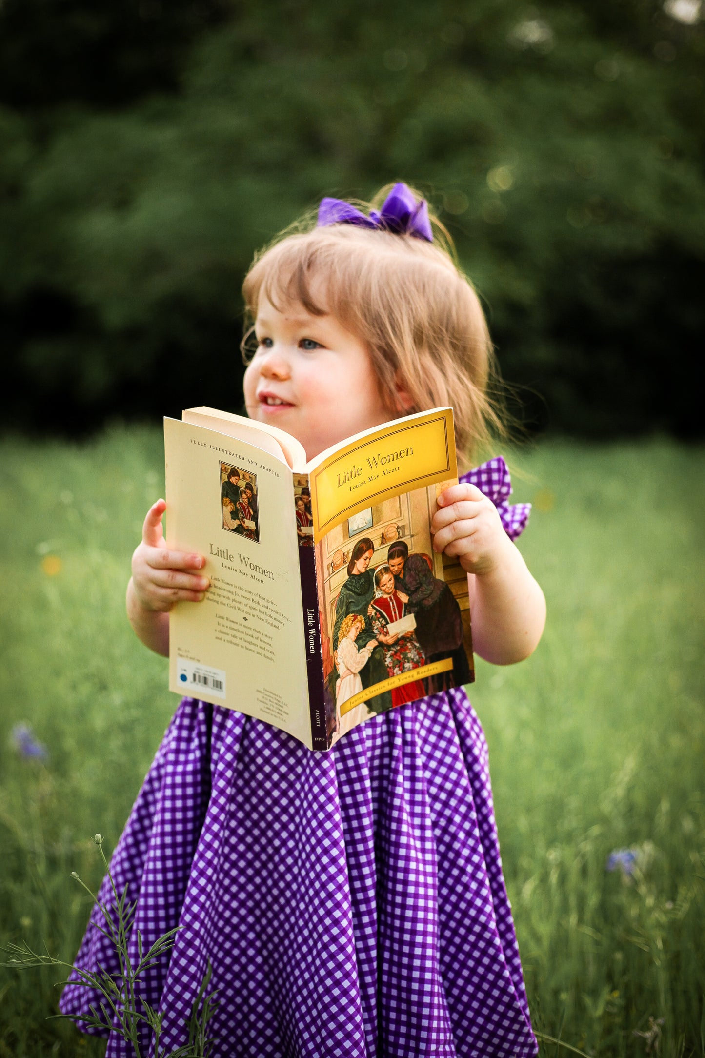 Young girl wearing a modest purple dress