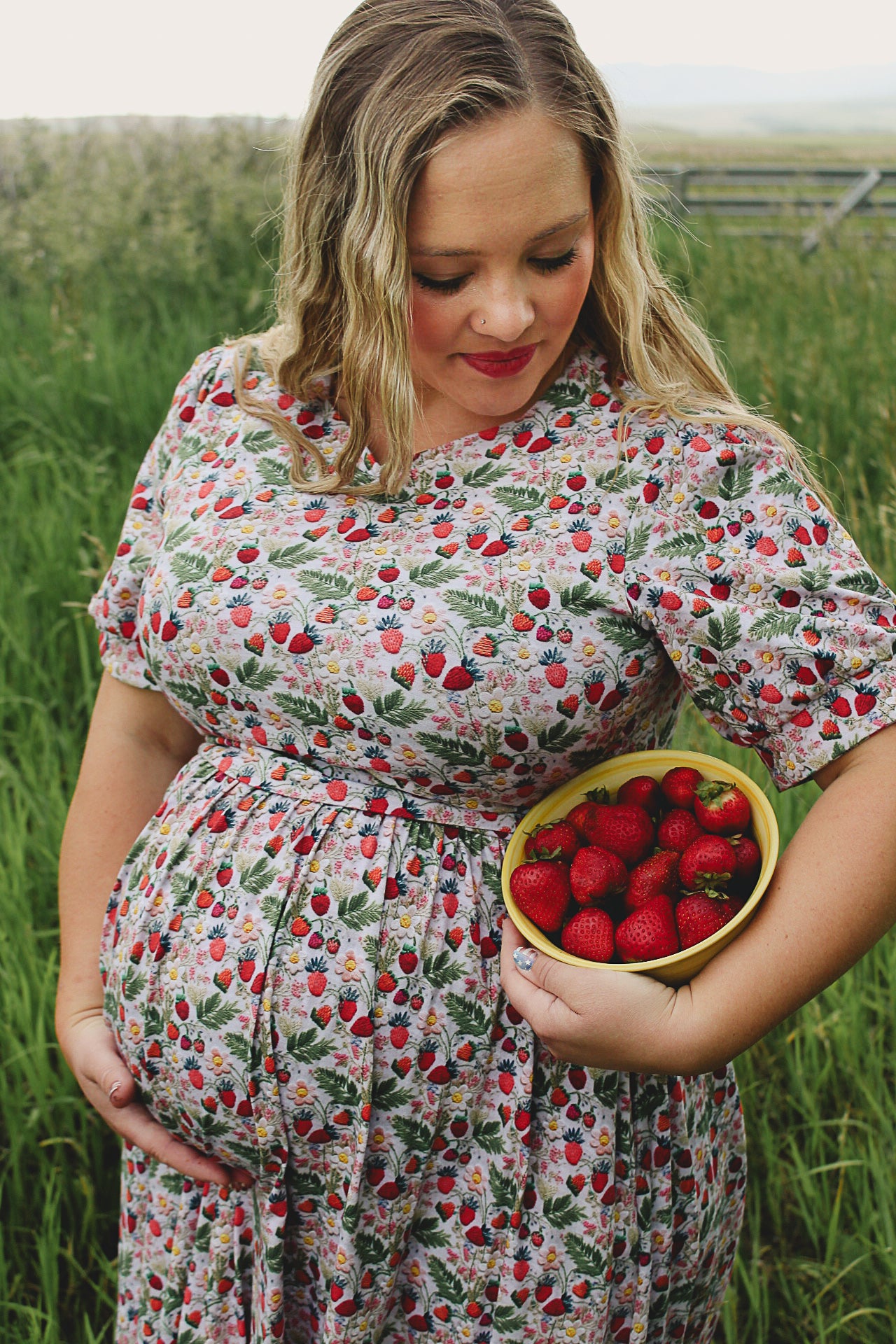 Woman in a floral modest nursing dress