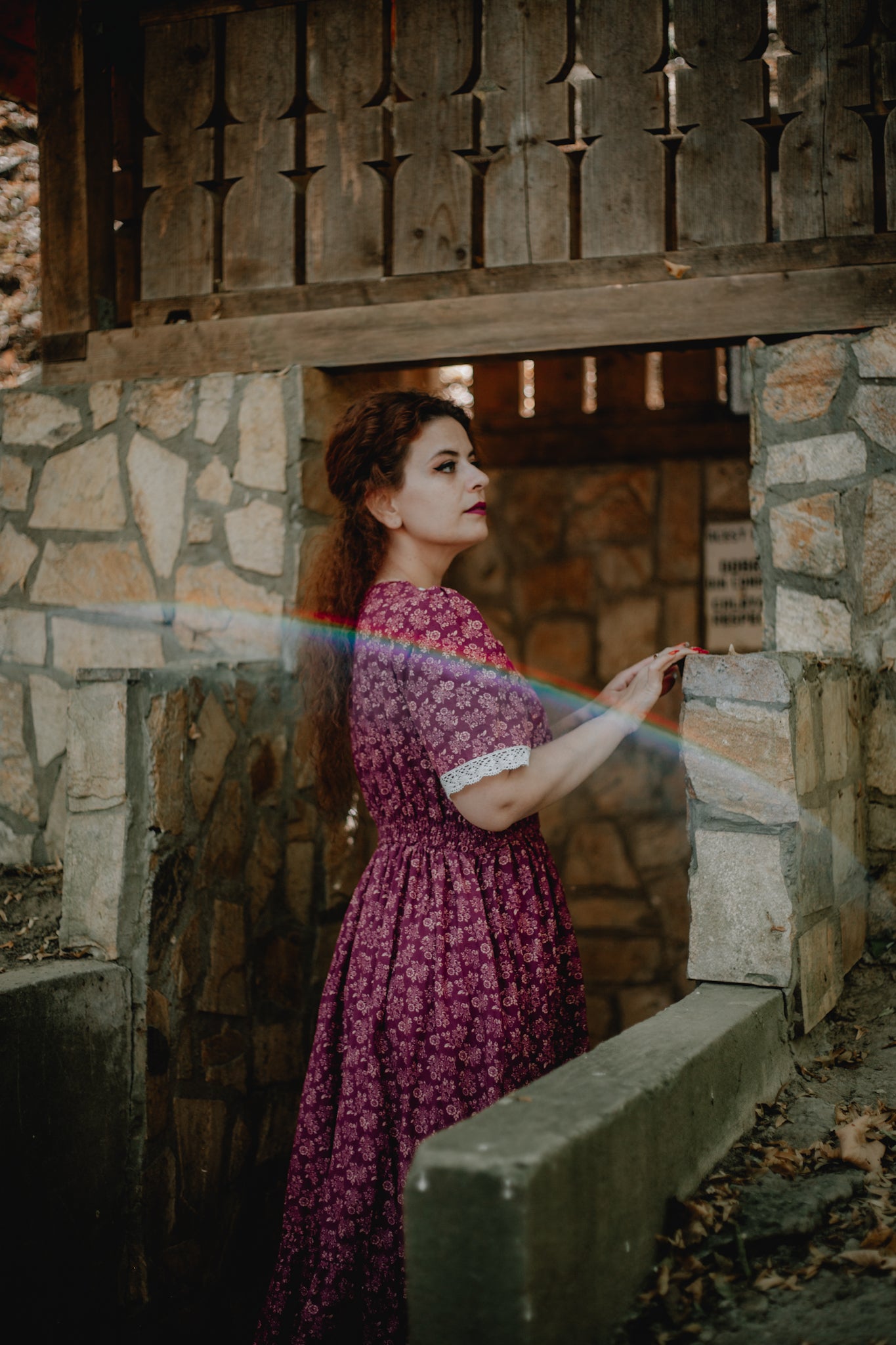 Woman in modest floral nursing dress