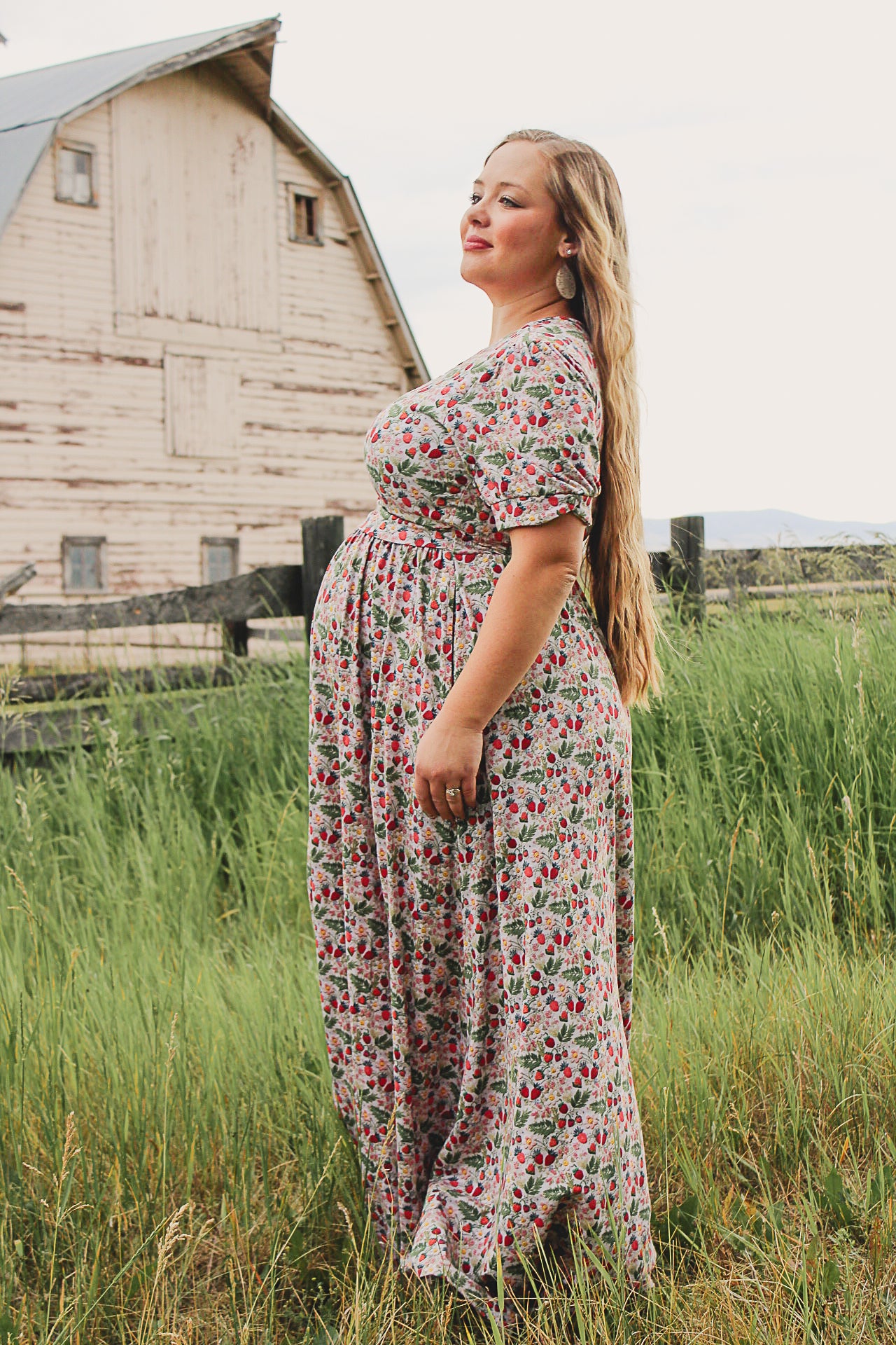 Woman in a floral modest nursing dress.