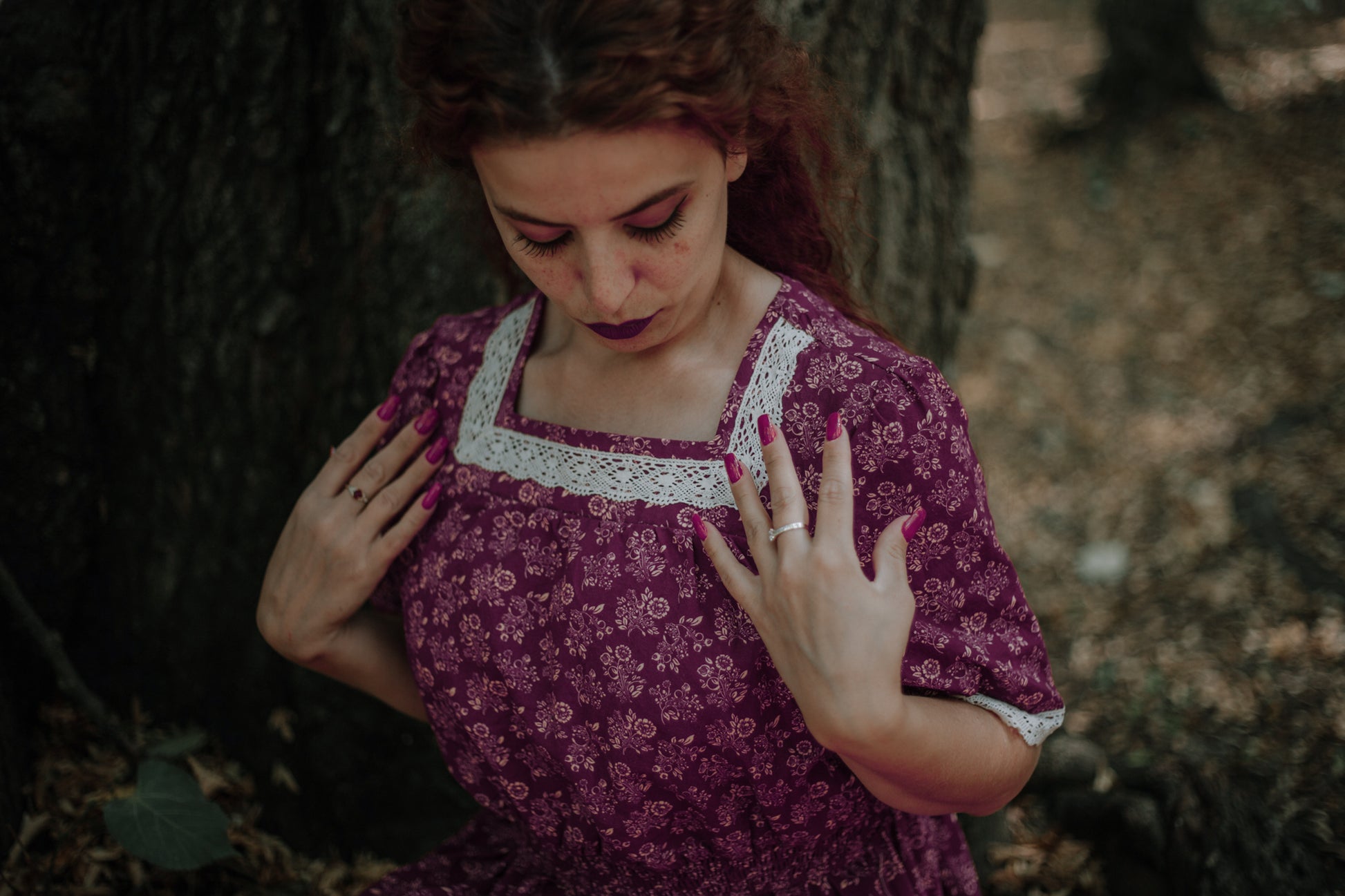 Woman in modest floral nursing dress outdoors