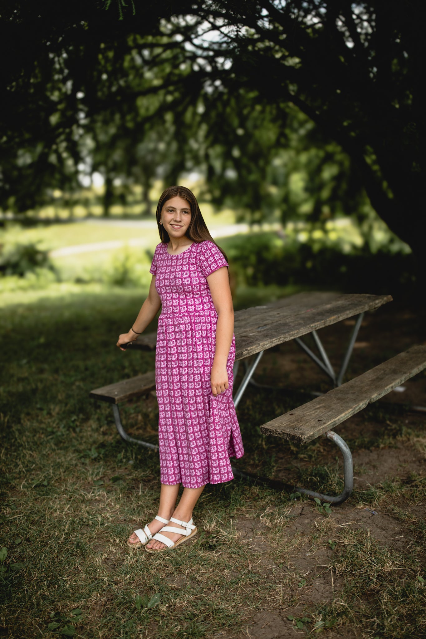 Young girl in a modest pink dress