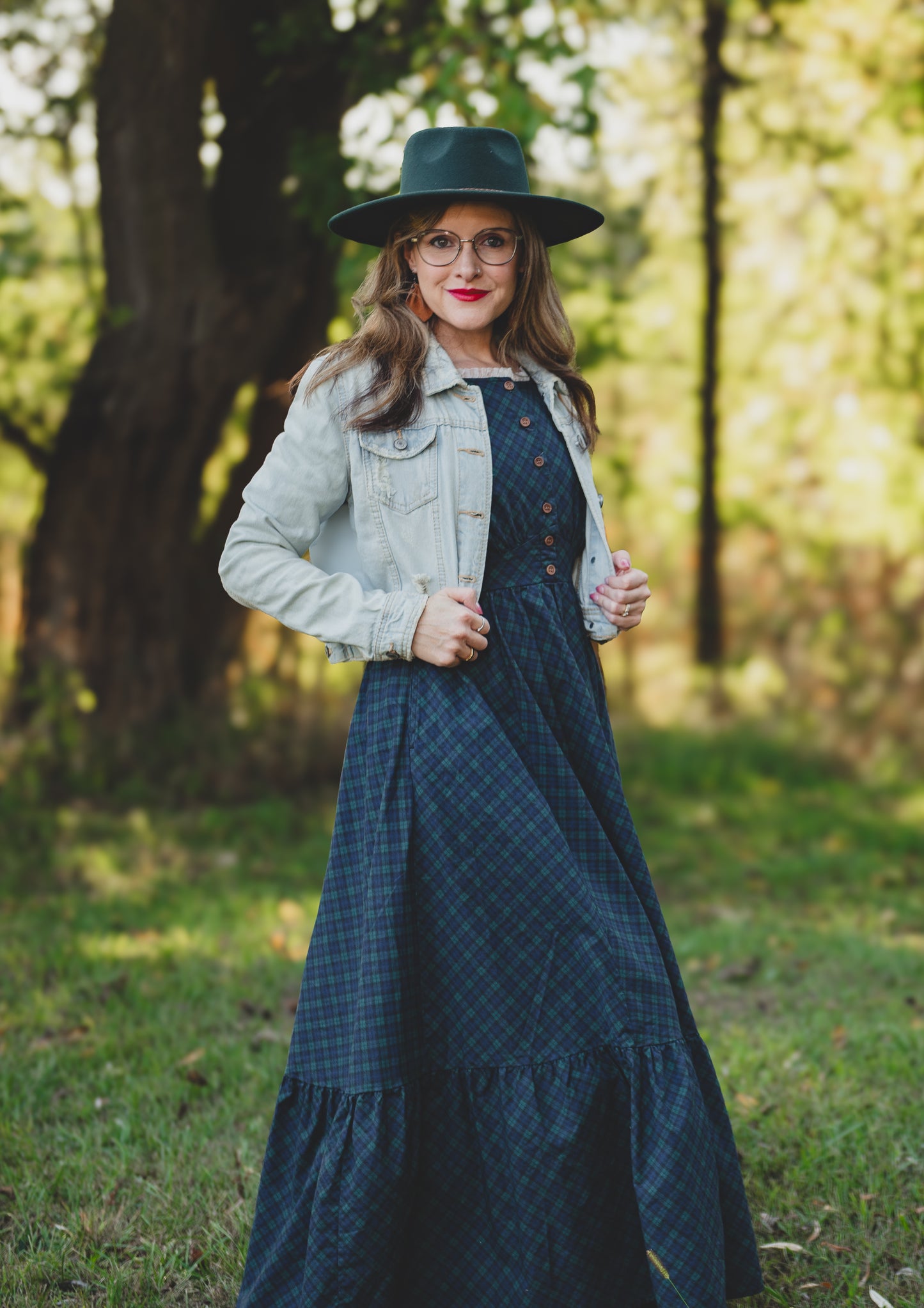 woman wearing a modest nursing blue patterned dress