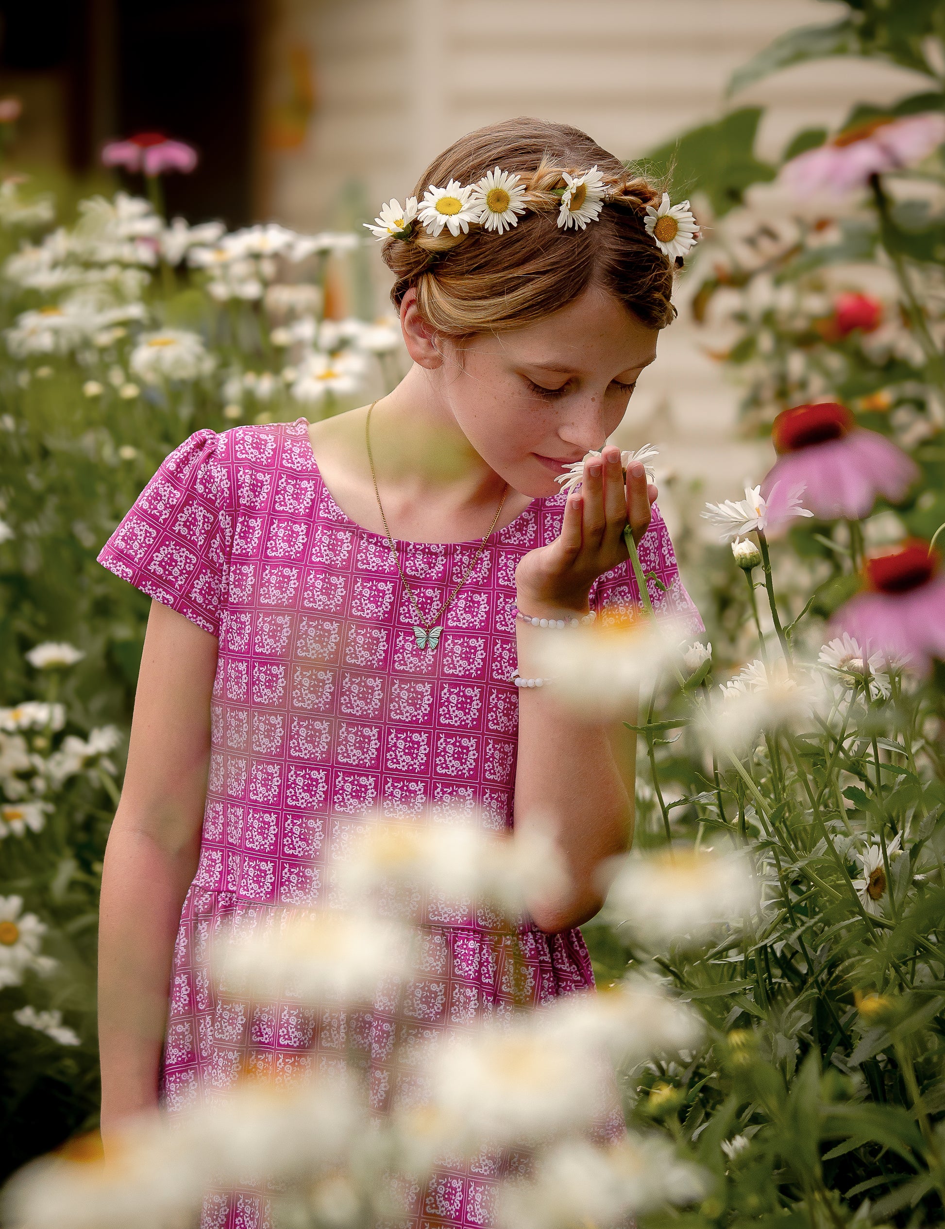 Young girl in a modest pink dress