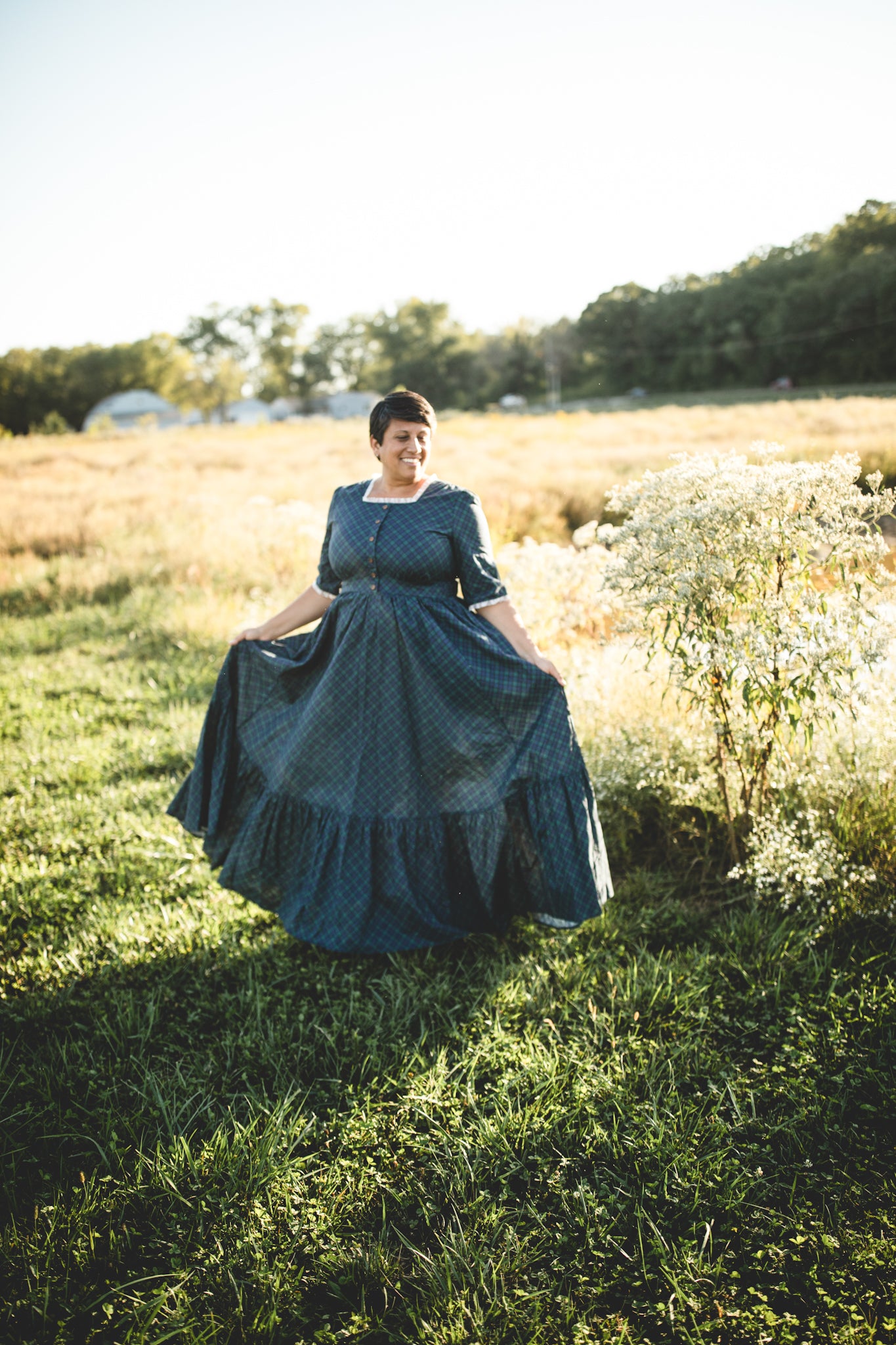 woman wearing a modest nursing blue patterned dress