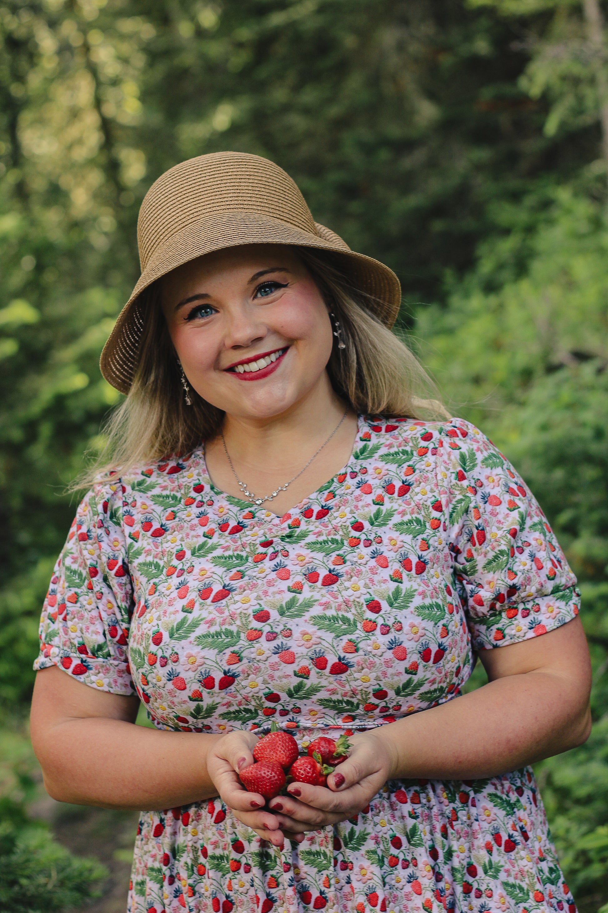 Woman in a floral modest nursing dress