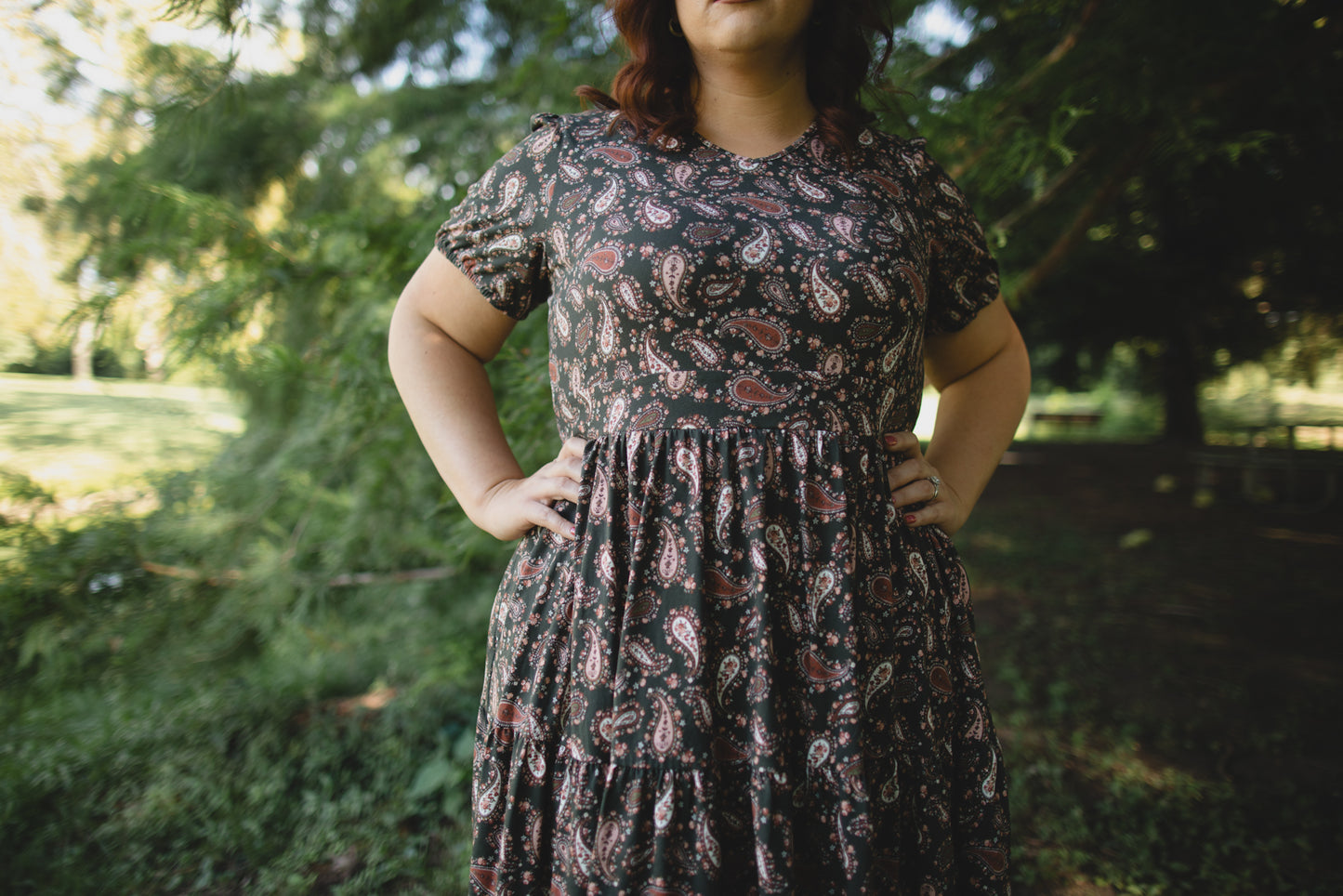 woman wearing a modest nursing floral dress
