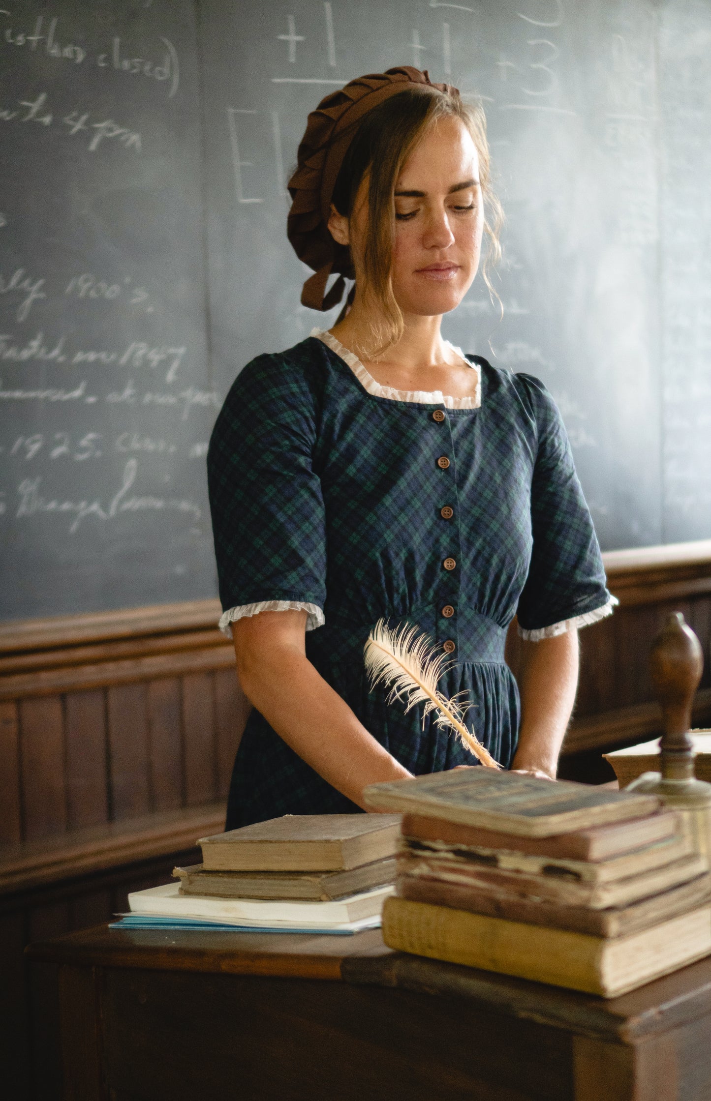 woman wearing a modest nursing blue patterned dress