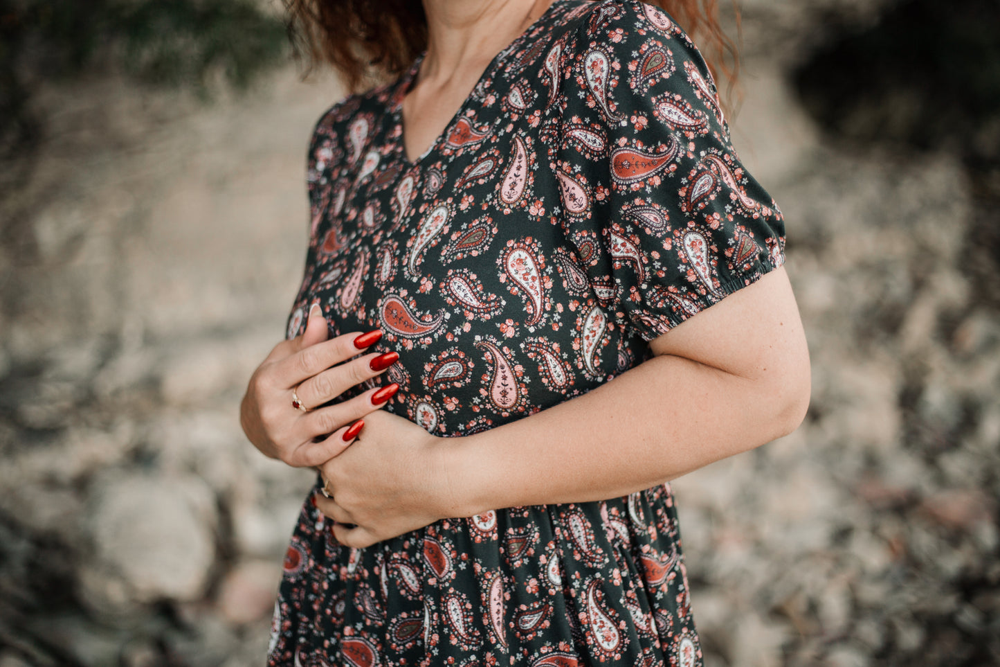 woman wearing a modest nursing floral dress