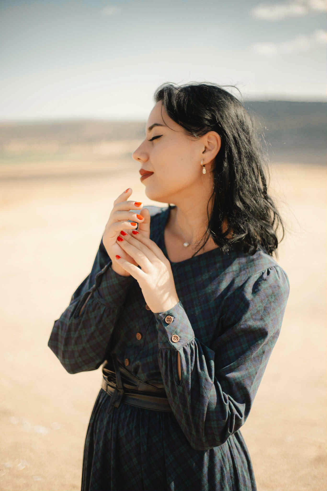 Woman in modest nursing dress beach outdoors