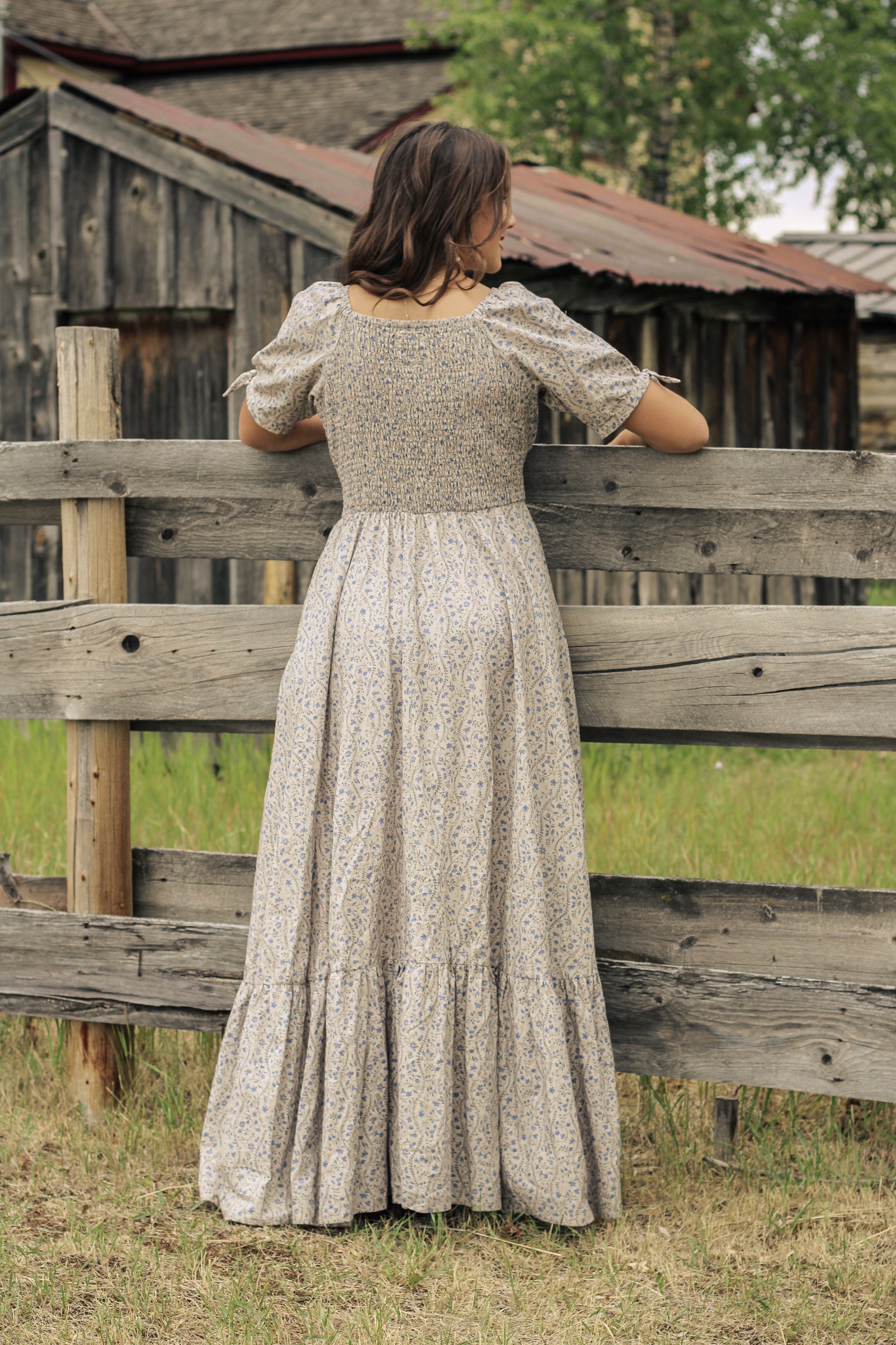 woman in patterned modest nursing dress