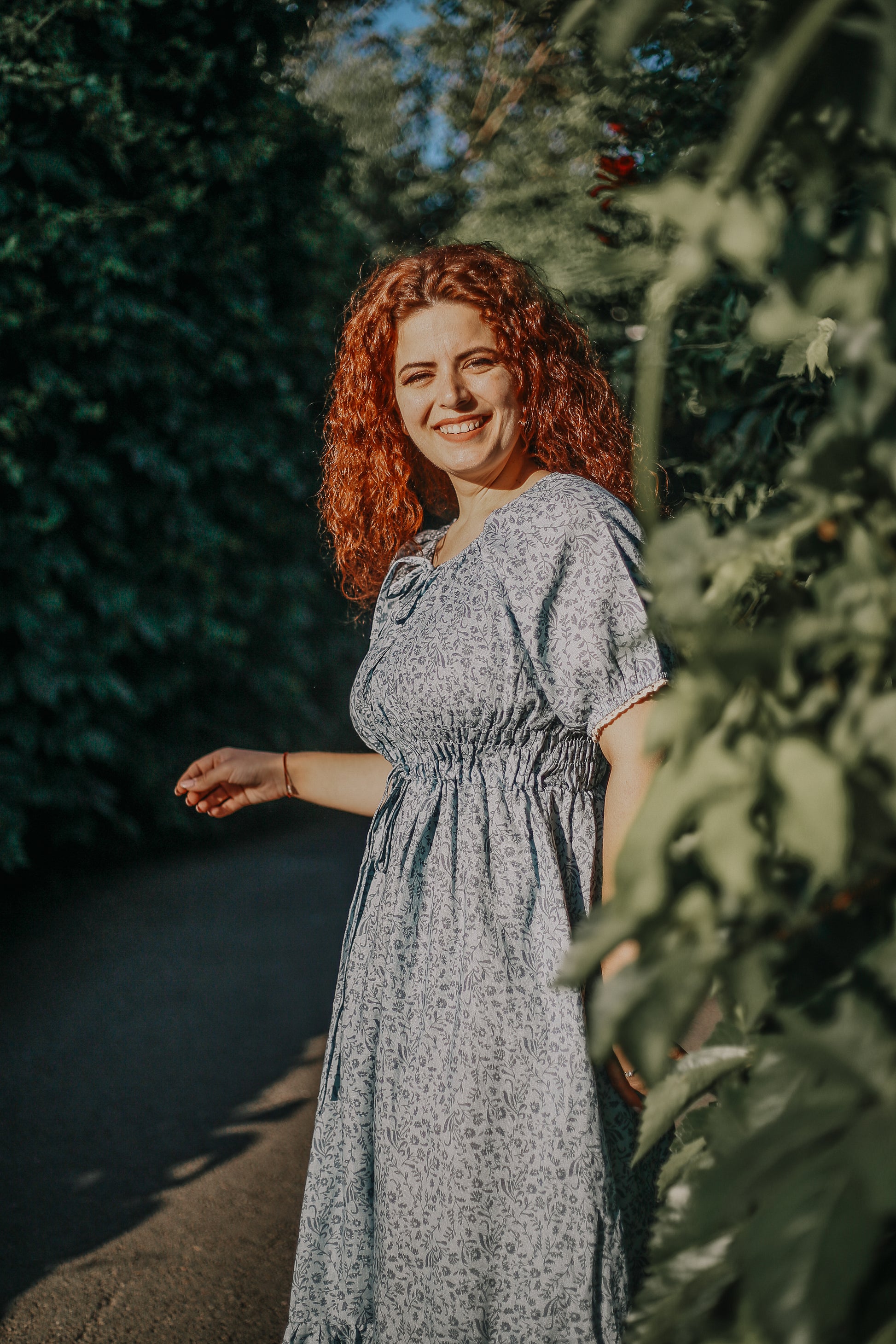 woman in a modest blue nursing dress