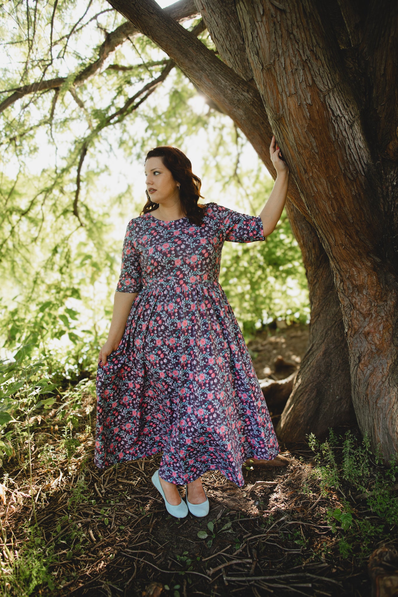 woman wearing a modest nursing floral dress