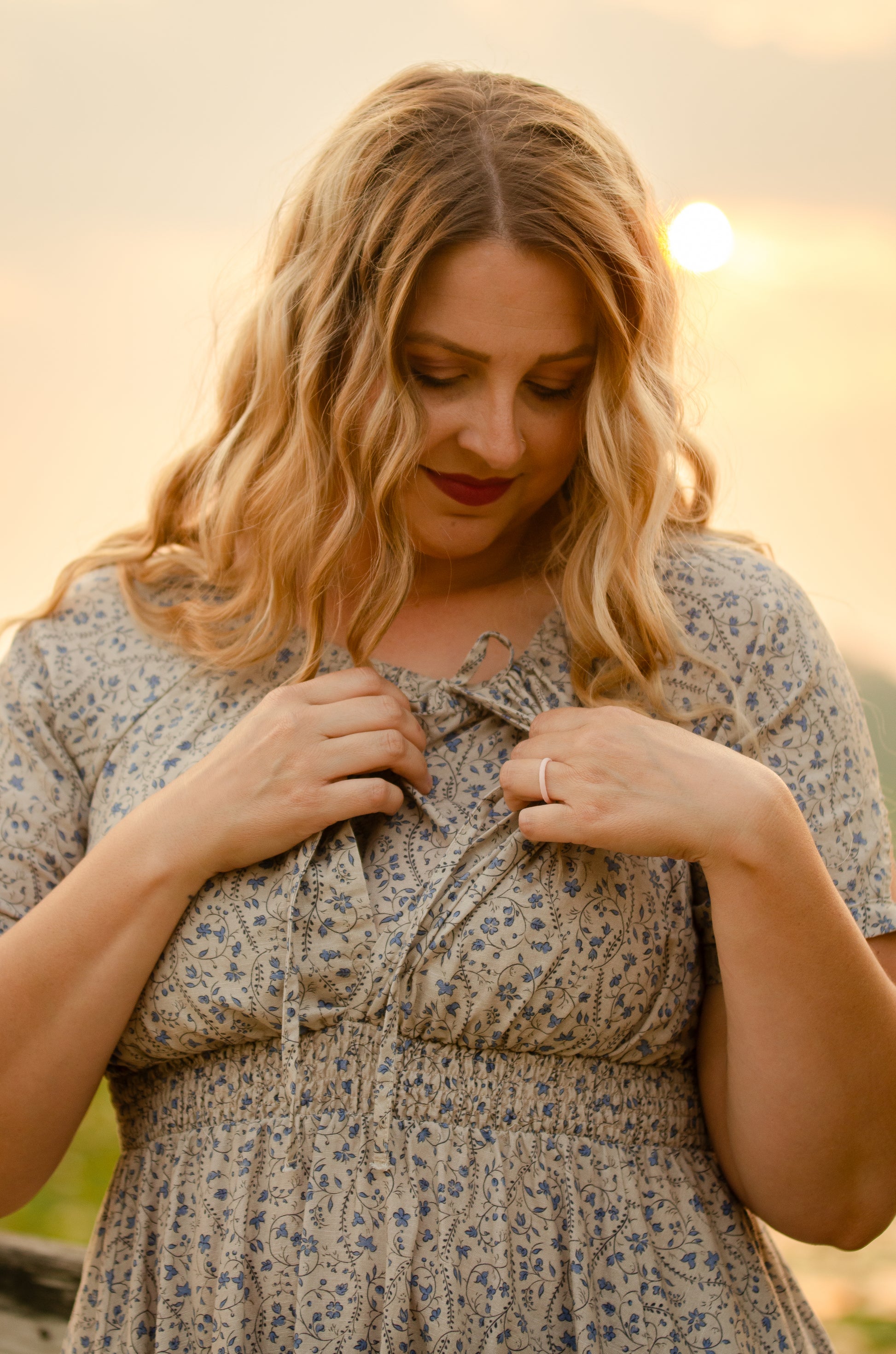 woman in patterned modest nursing dress