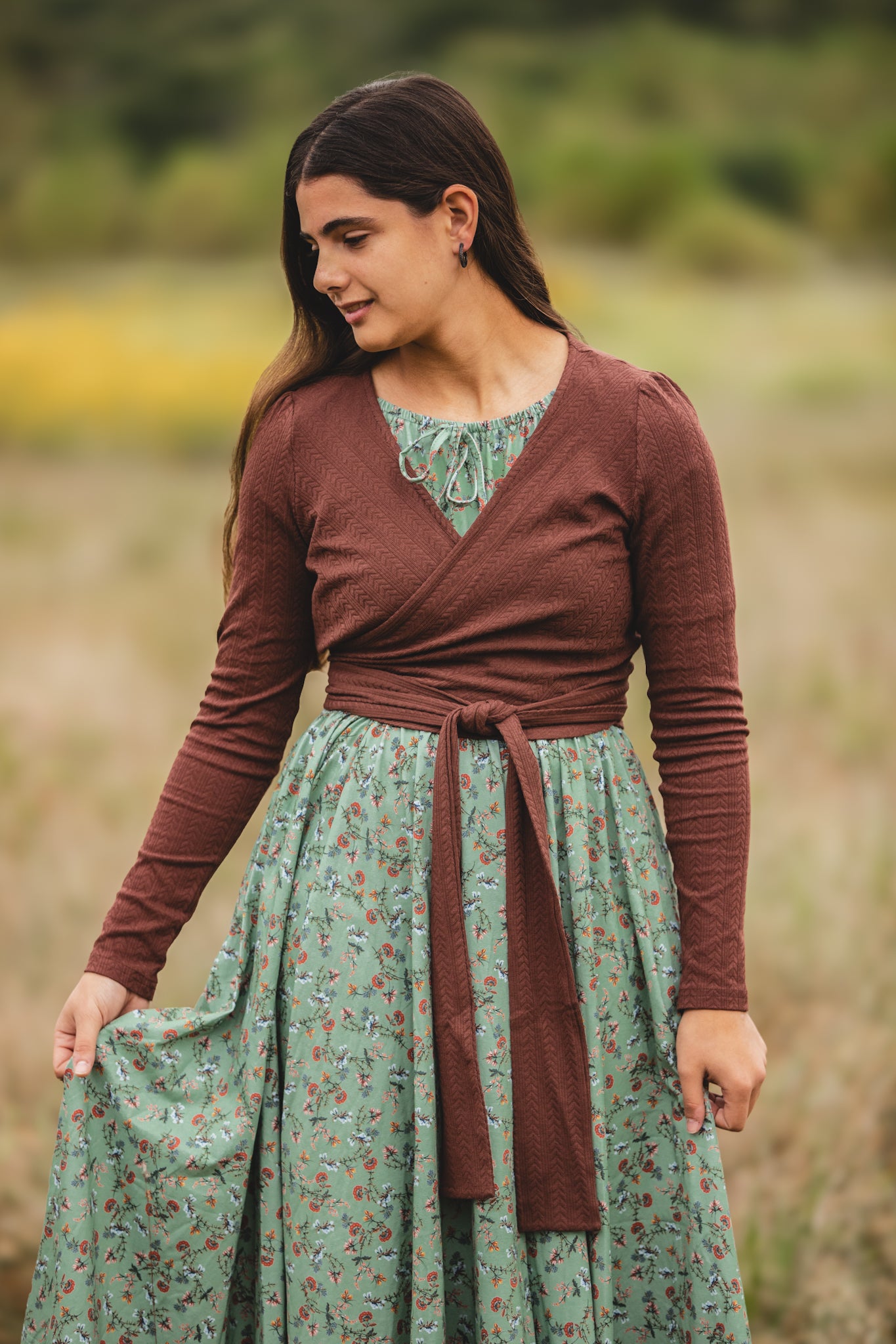 Woman in modest nursing floral dress outdoors
