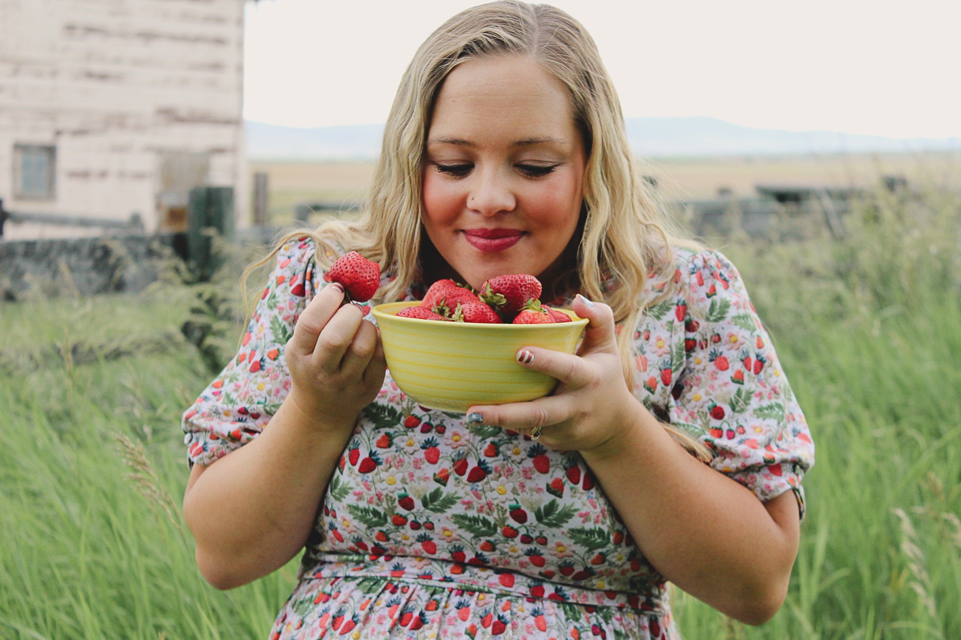 Woman in a floral modest nursing dress