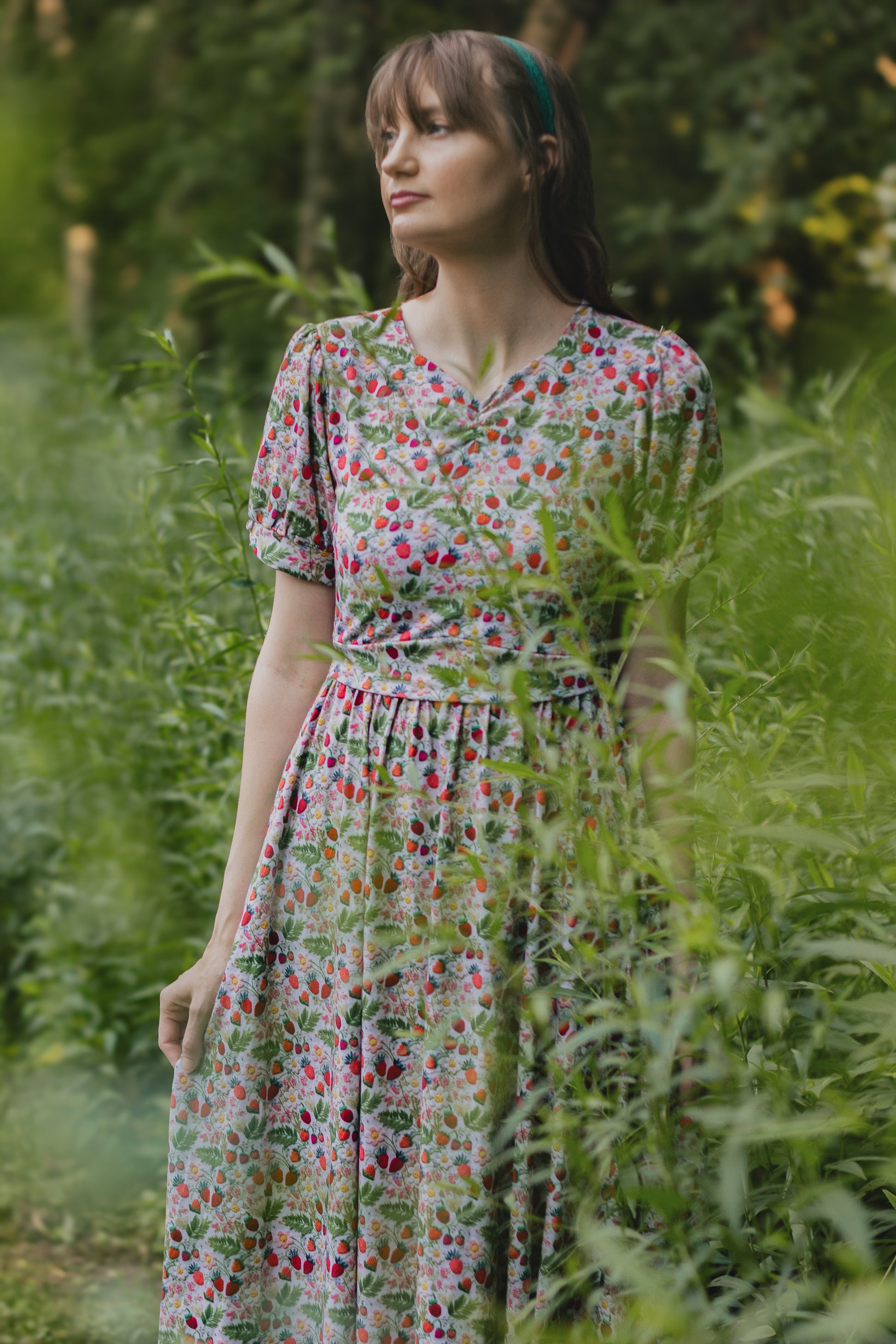 Woman in a floral modest nursing dress