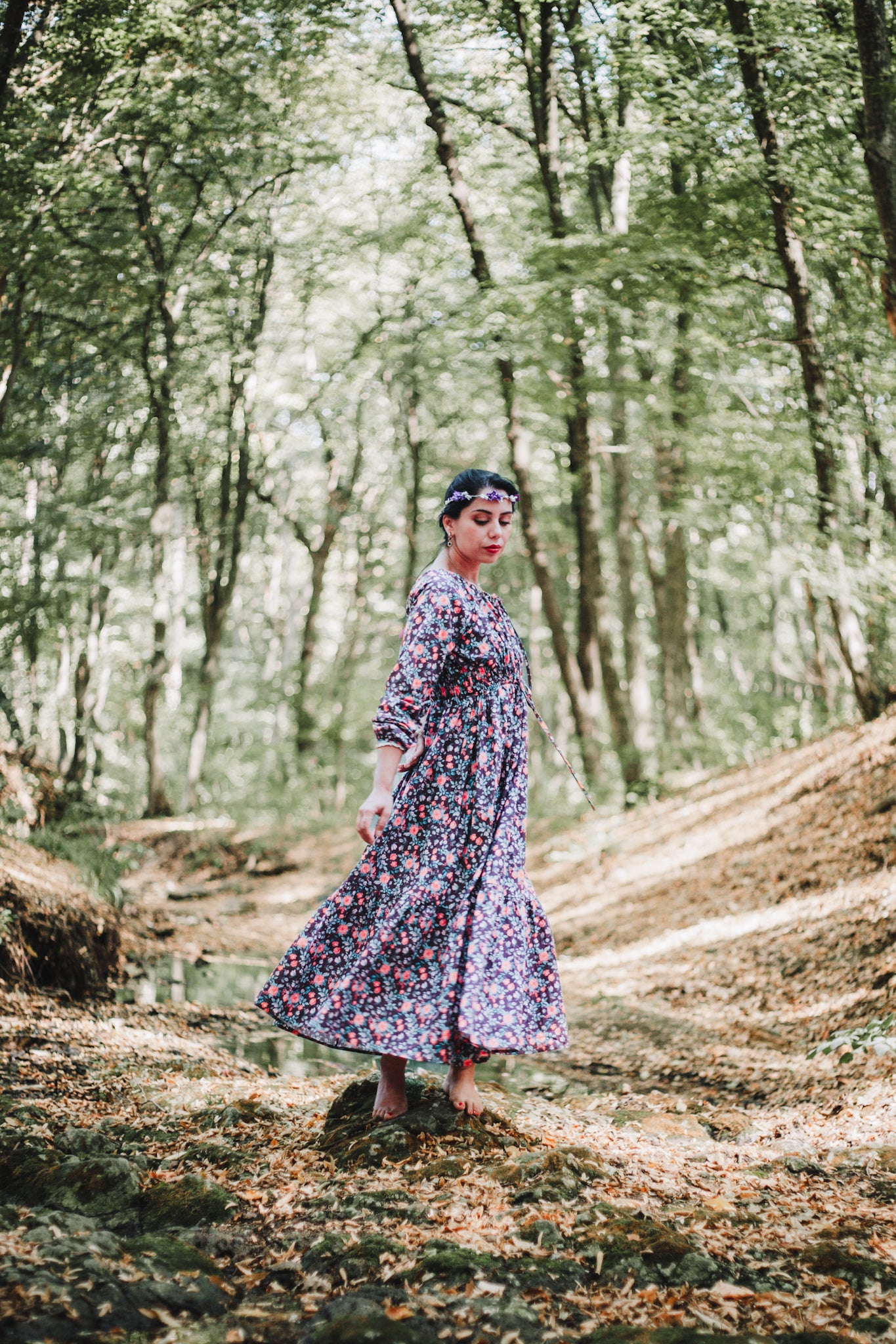Woman in modest nursing floral dress outdoors