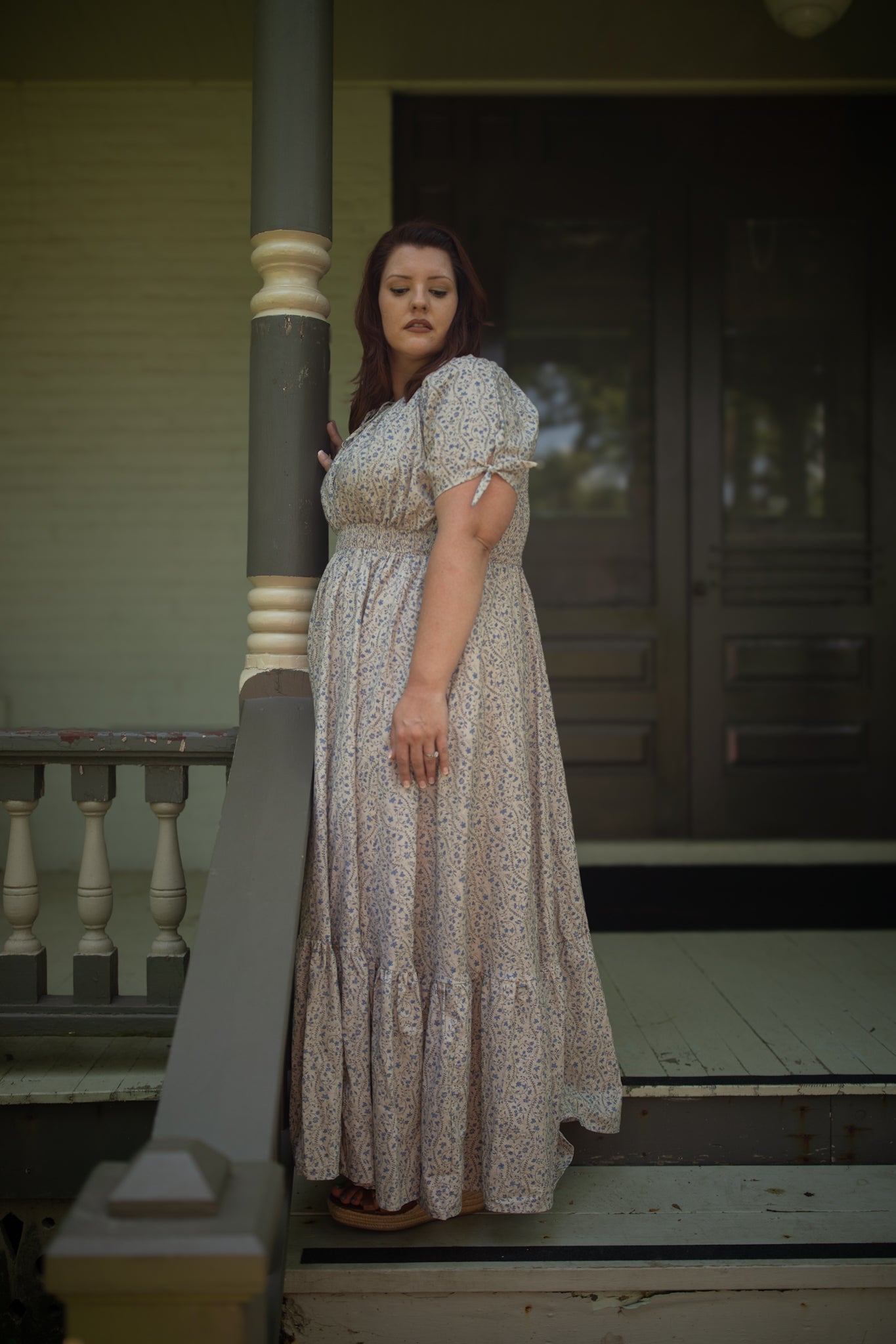 woman in patterned modest nursing dress