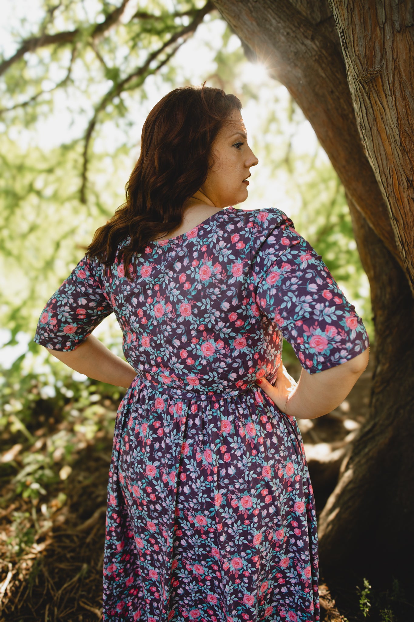 woman wearing a modest nursing floral dress