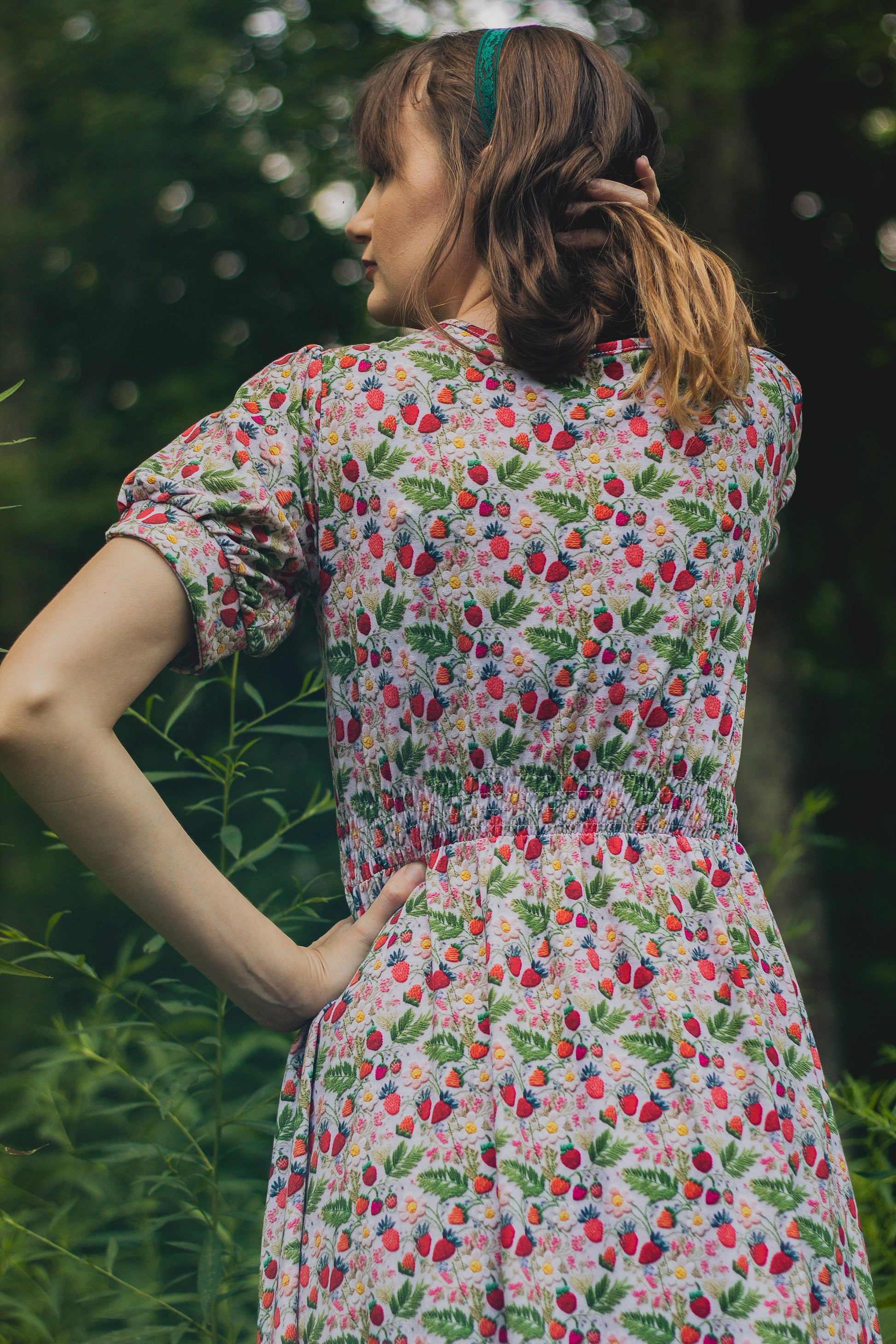 Woman in a floral modest nursing dress