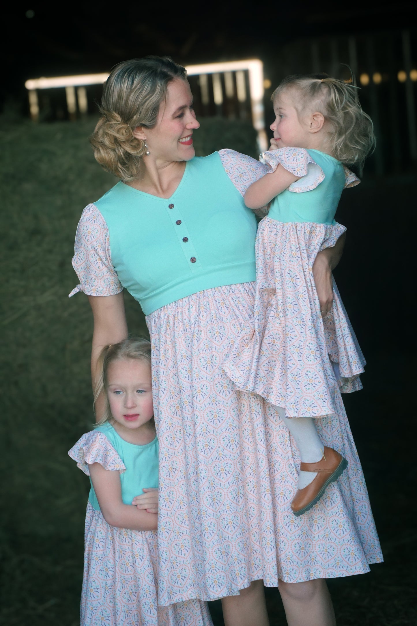 Mother and daughter wearing vintage style modest dresses.