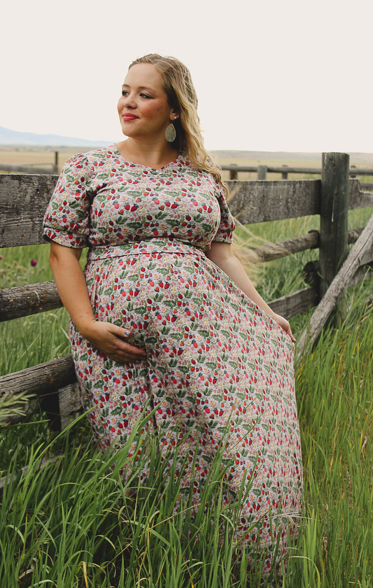 Woman in a floral modest nursing dress.