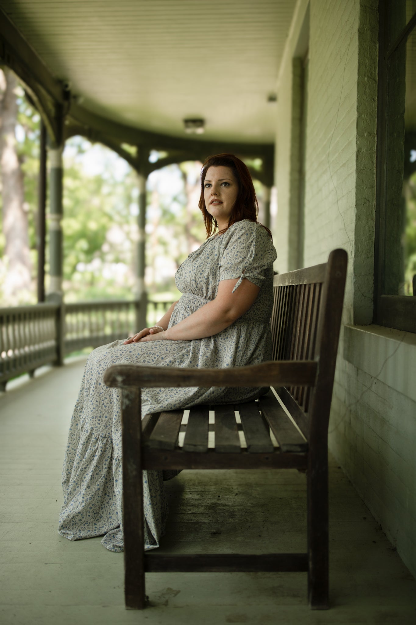 woman in patterned modest nursing dress