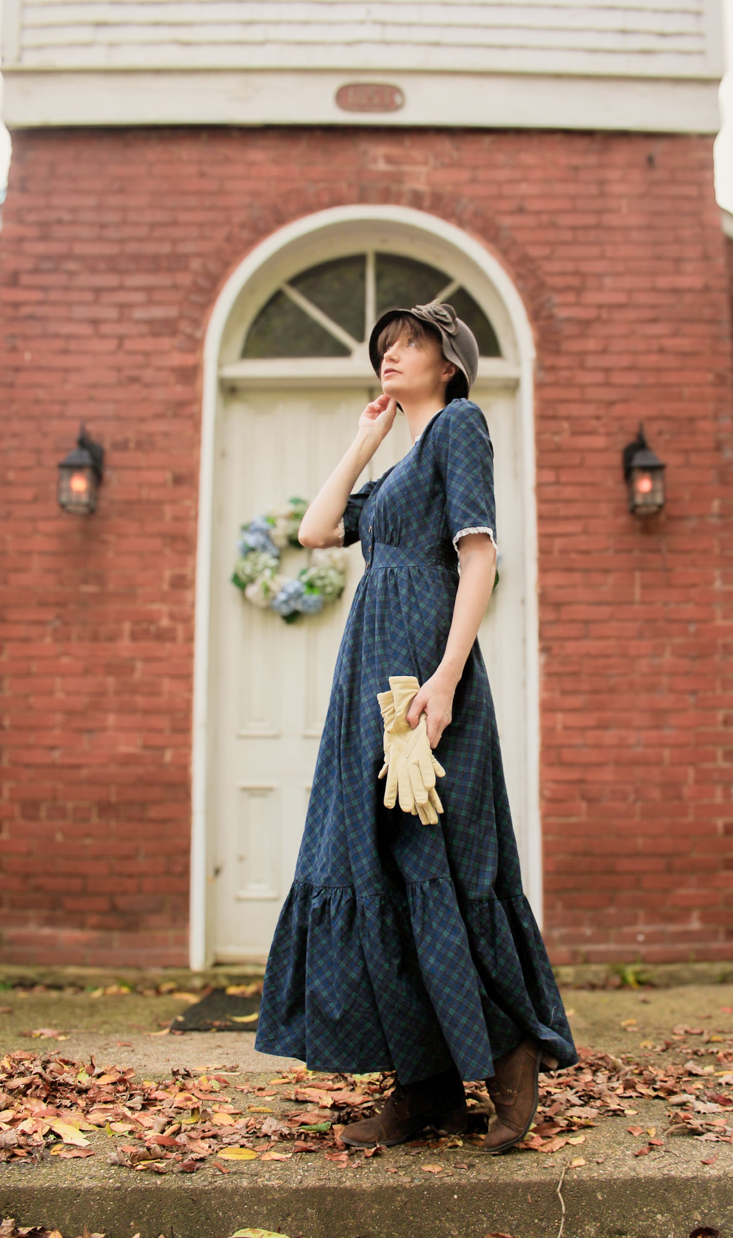 woman wearing a modest nursing blue patterned dress