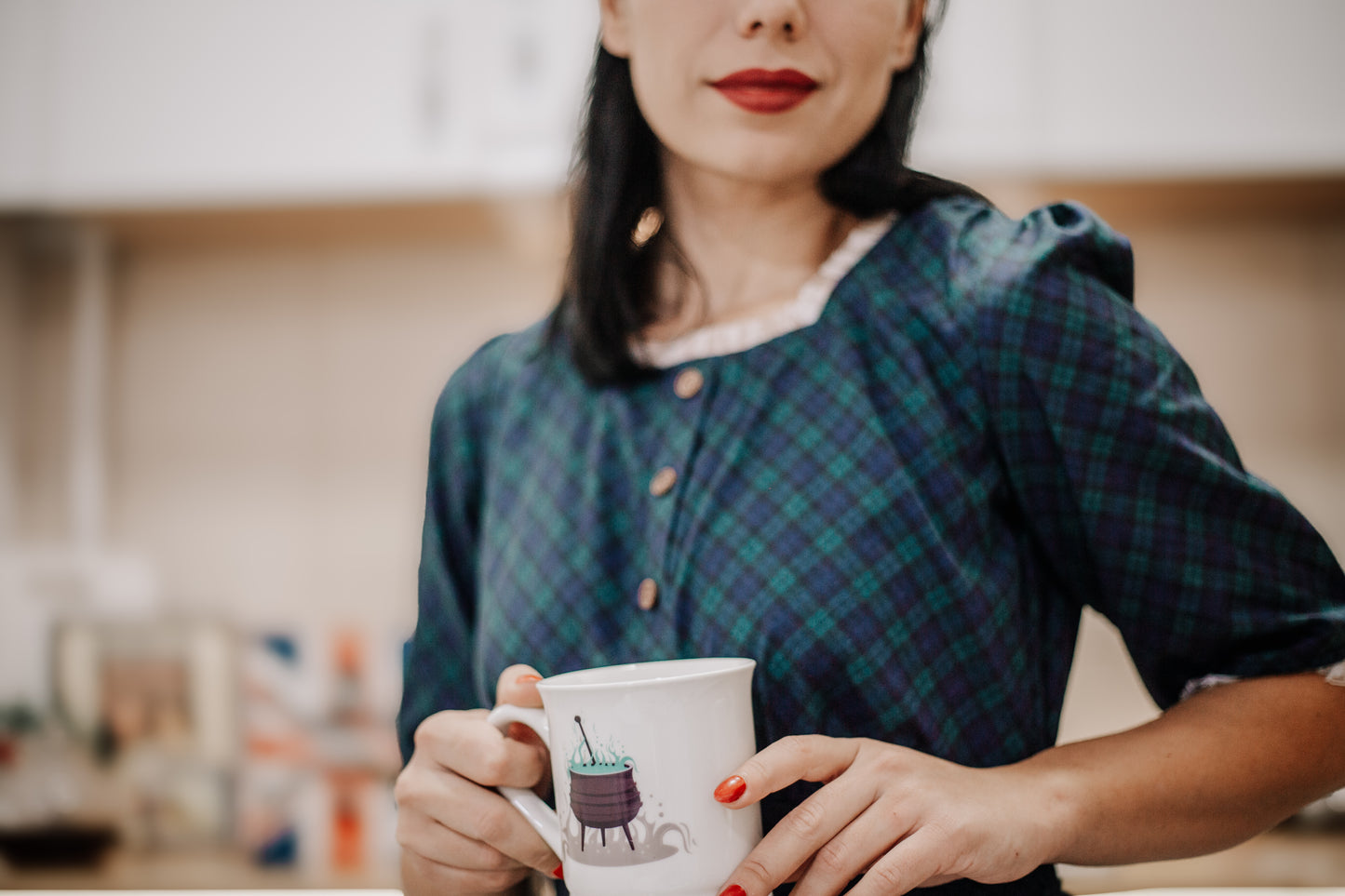 woman wearing a modest nursing blue patterned dress