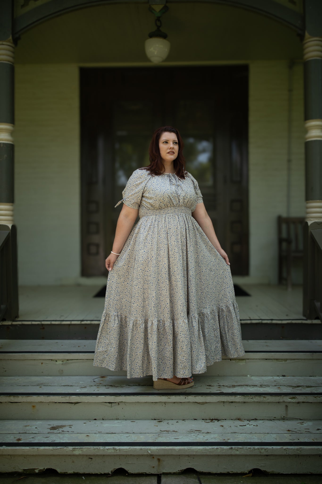 woman in patterned modest nursing dress