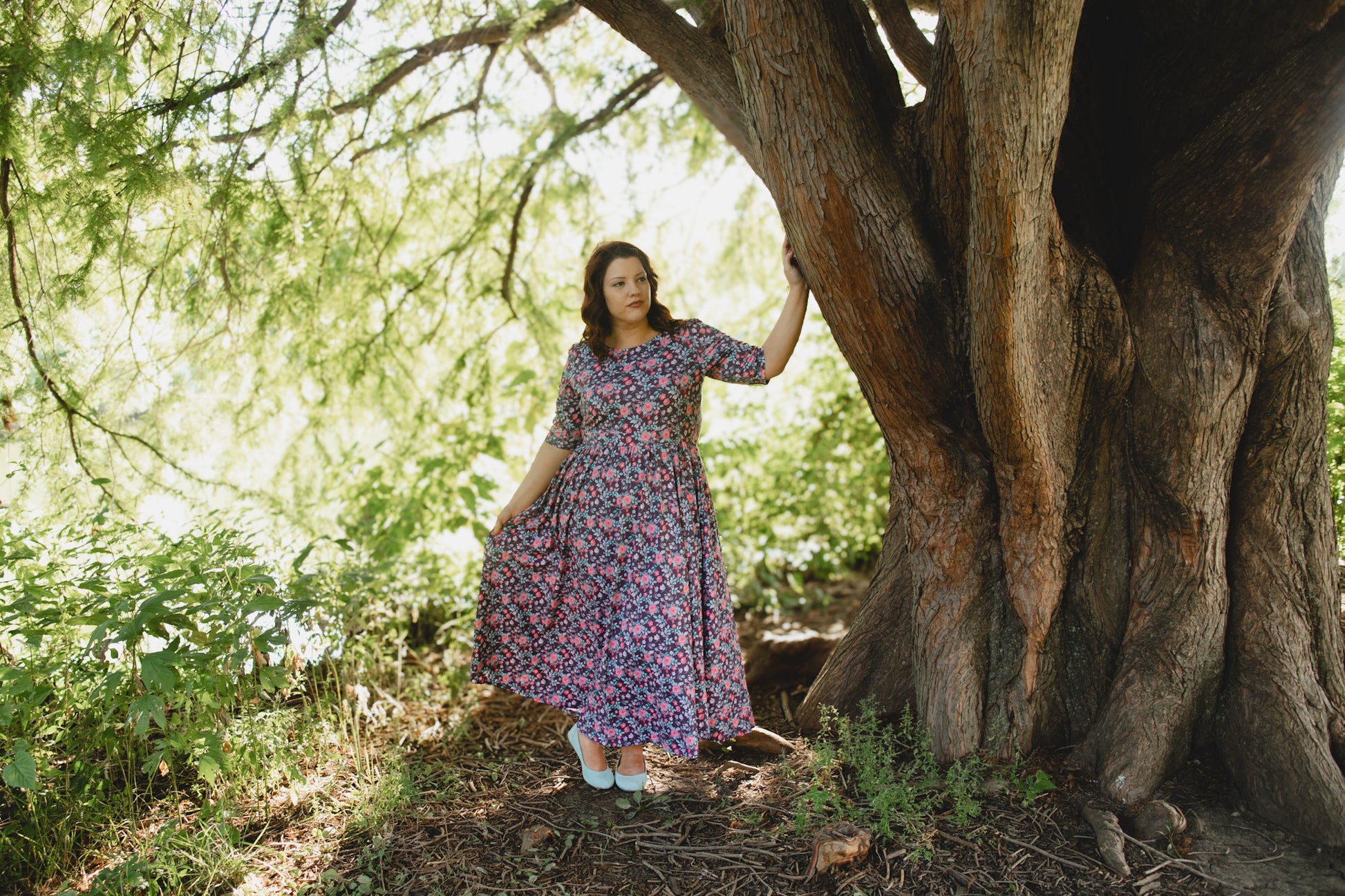 woman wearing a modest nursing floral dress