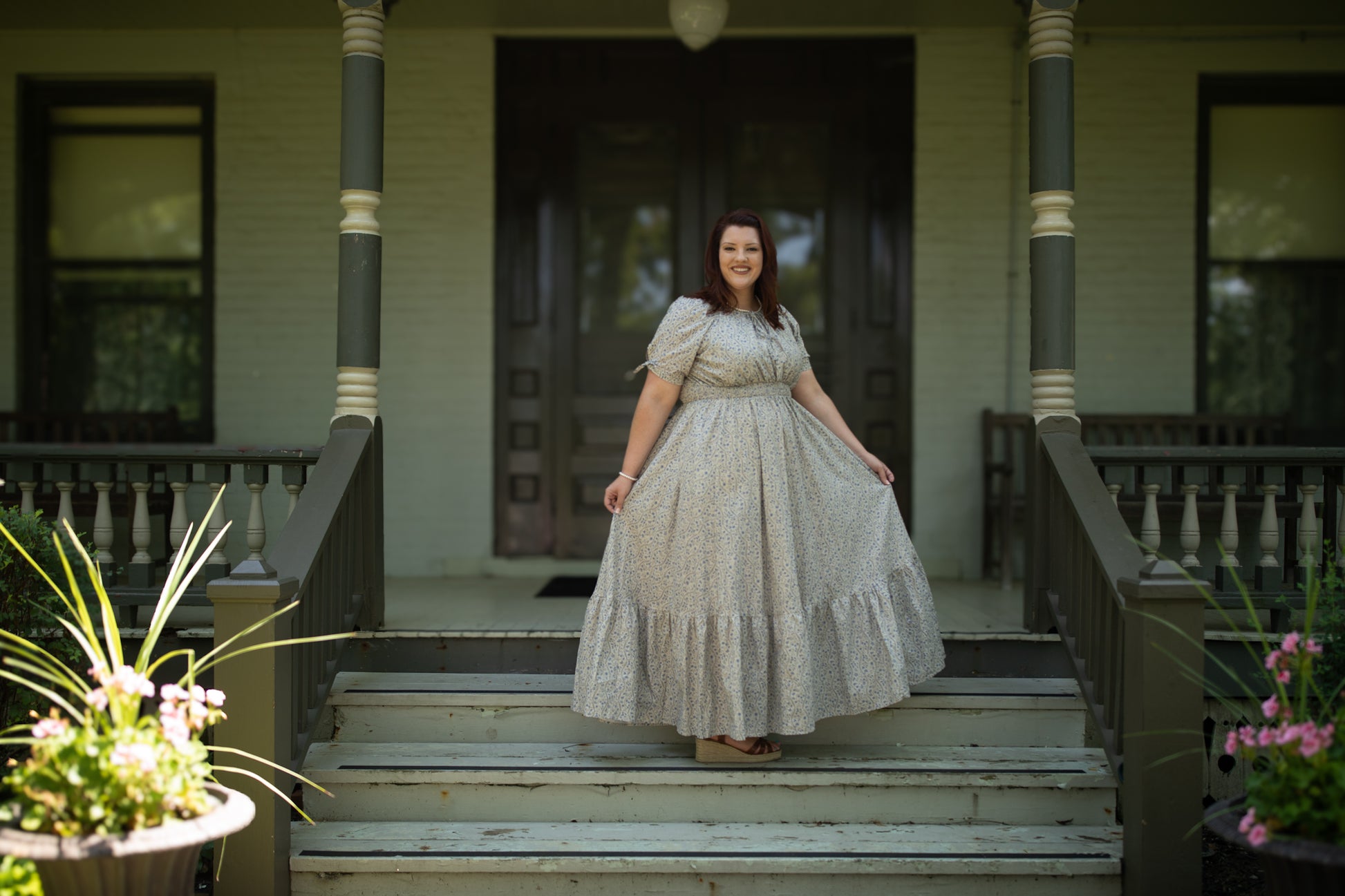 woman in patterned modest nursing dress