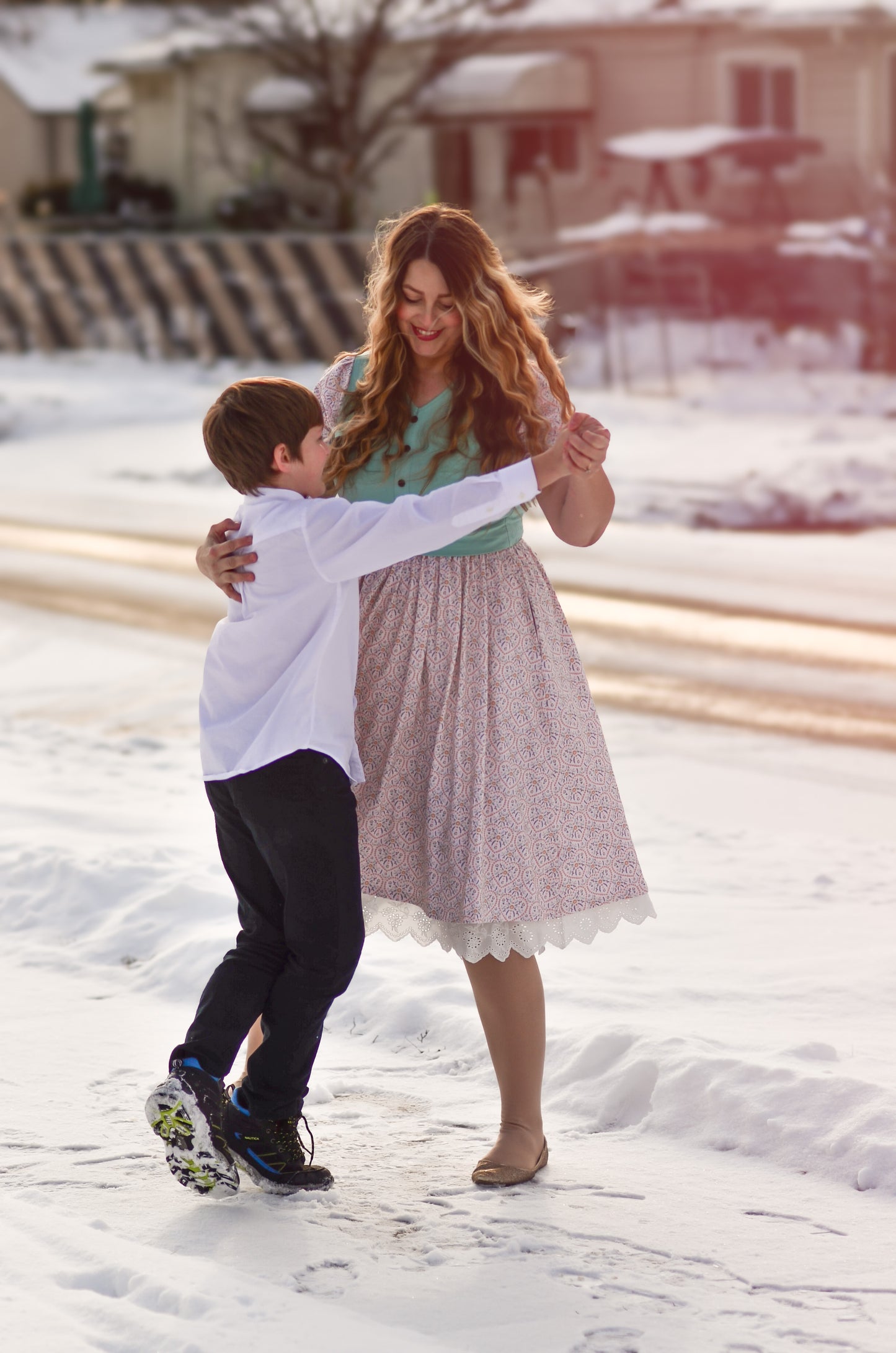 A woman wearing a vintage style modest nursing dress.