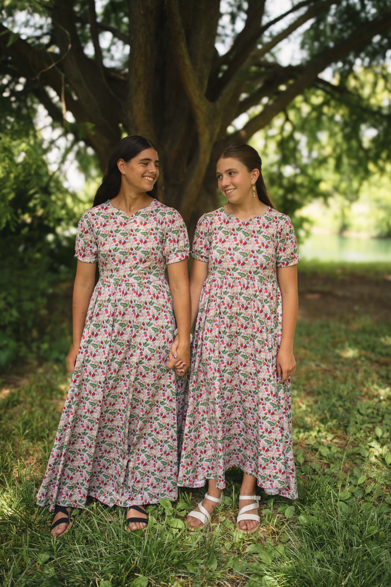 Woman in a floral modest nursing dress