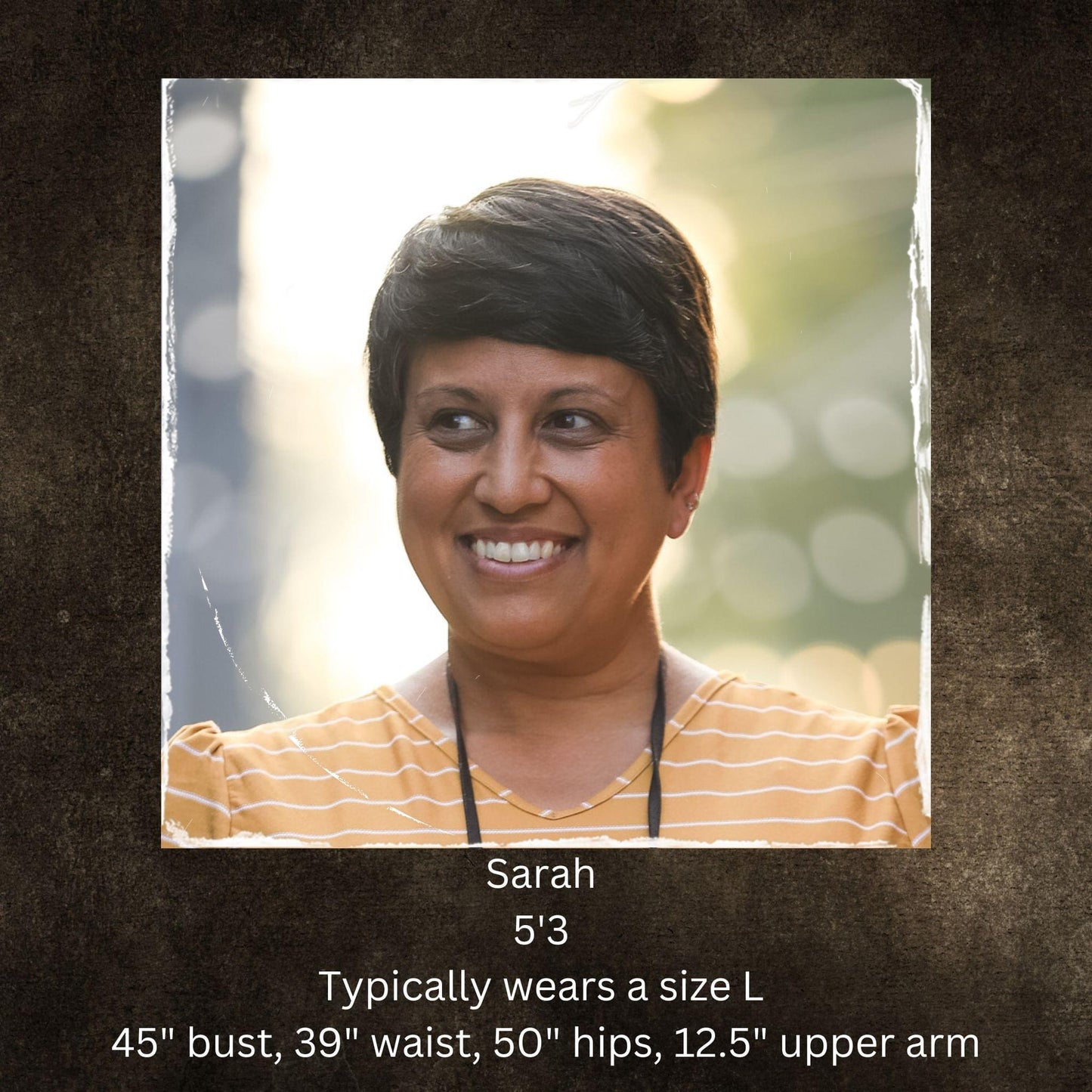 Woman in striped shirt smiling, model stats