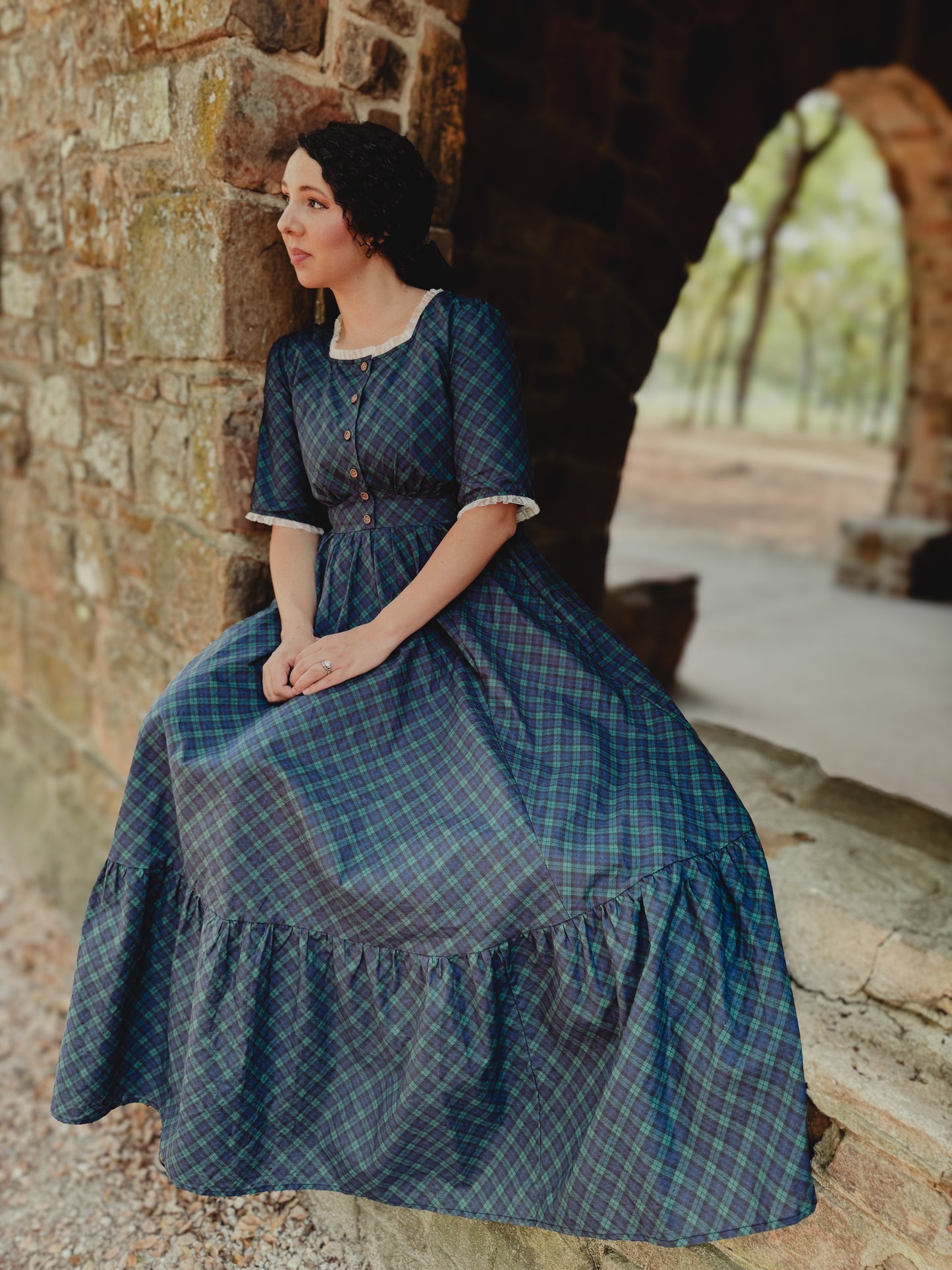 woman wearing a modest nursing blue patterned dress