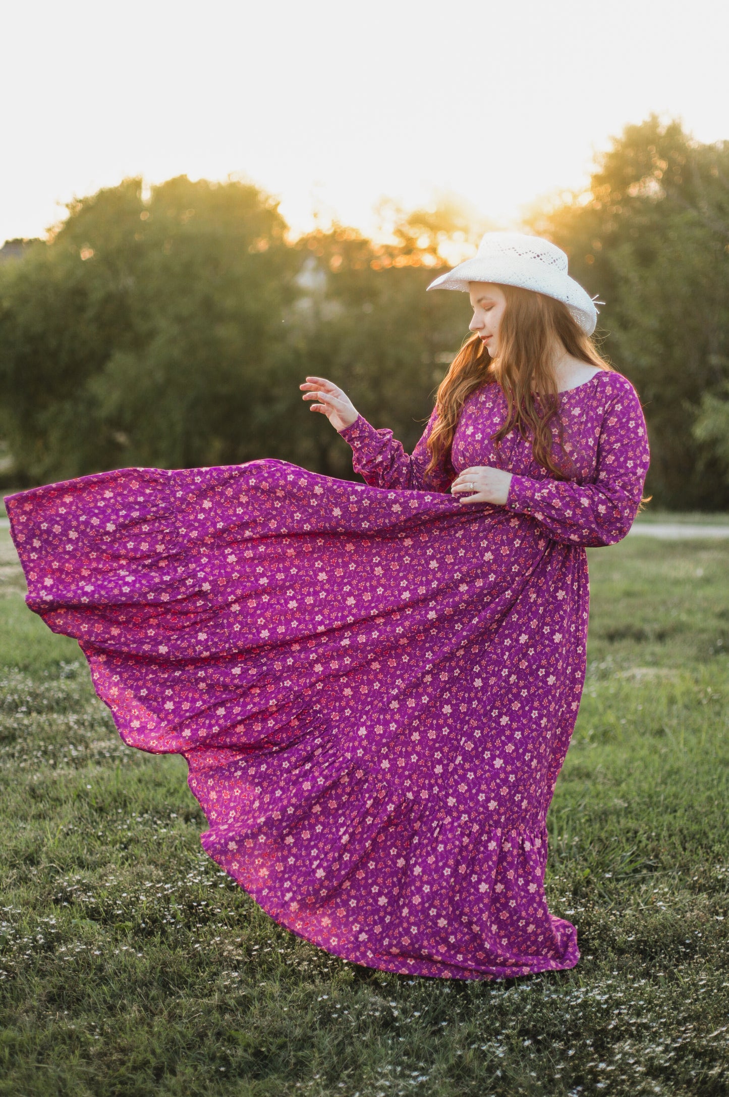 Woman in modest purple floral nursing dress
