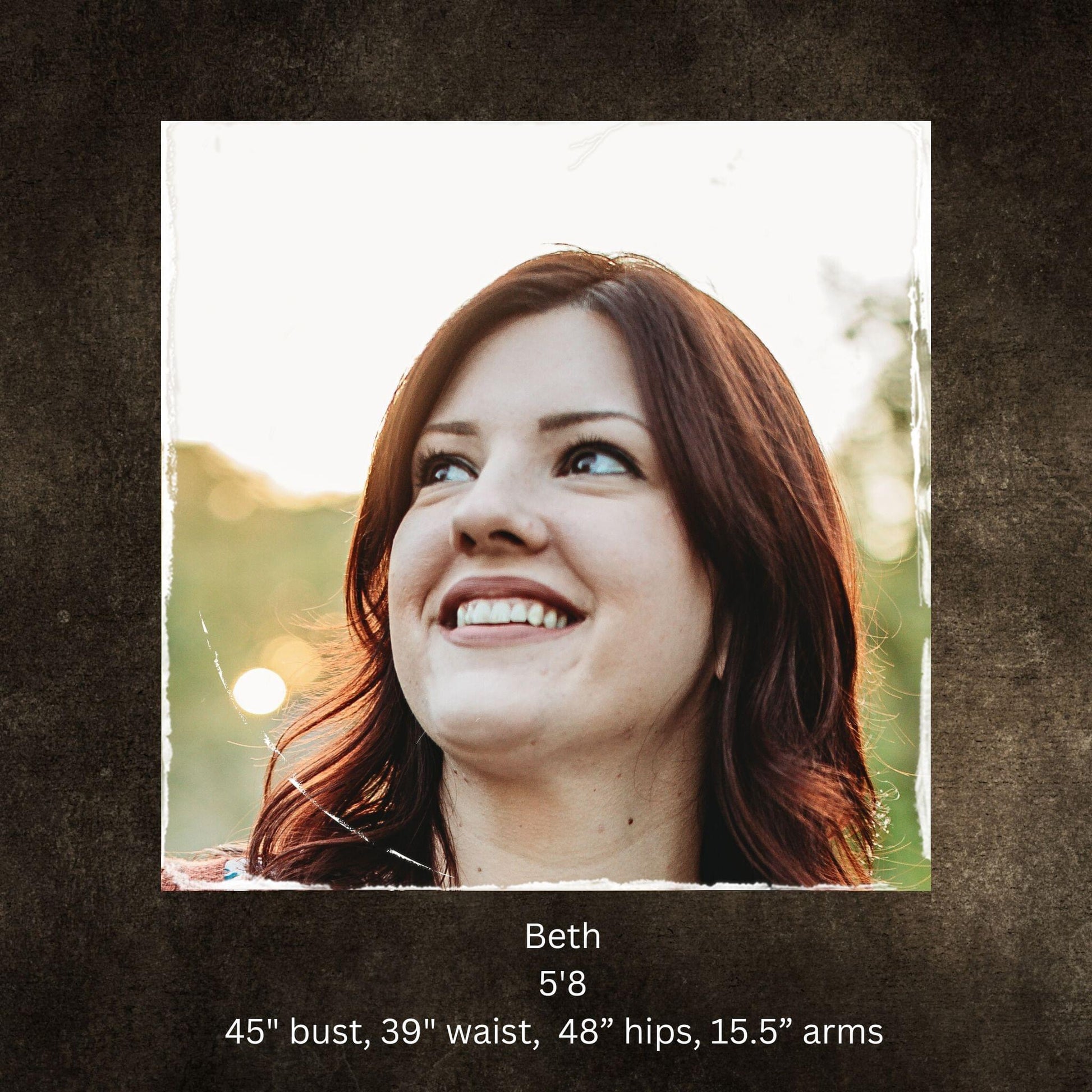 Woman with red hair smiling outdoors, with text about her measurements.