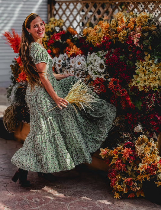 woman wearing a modest nursing green floral dress