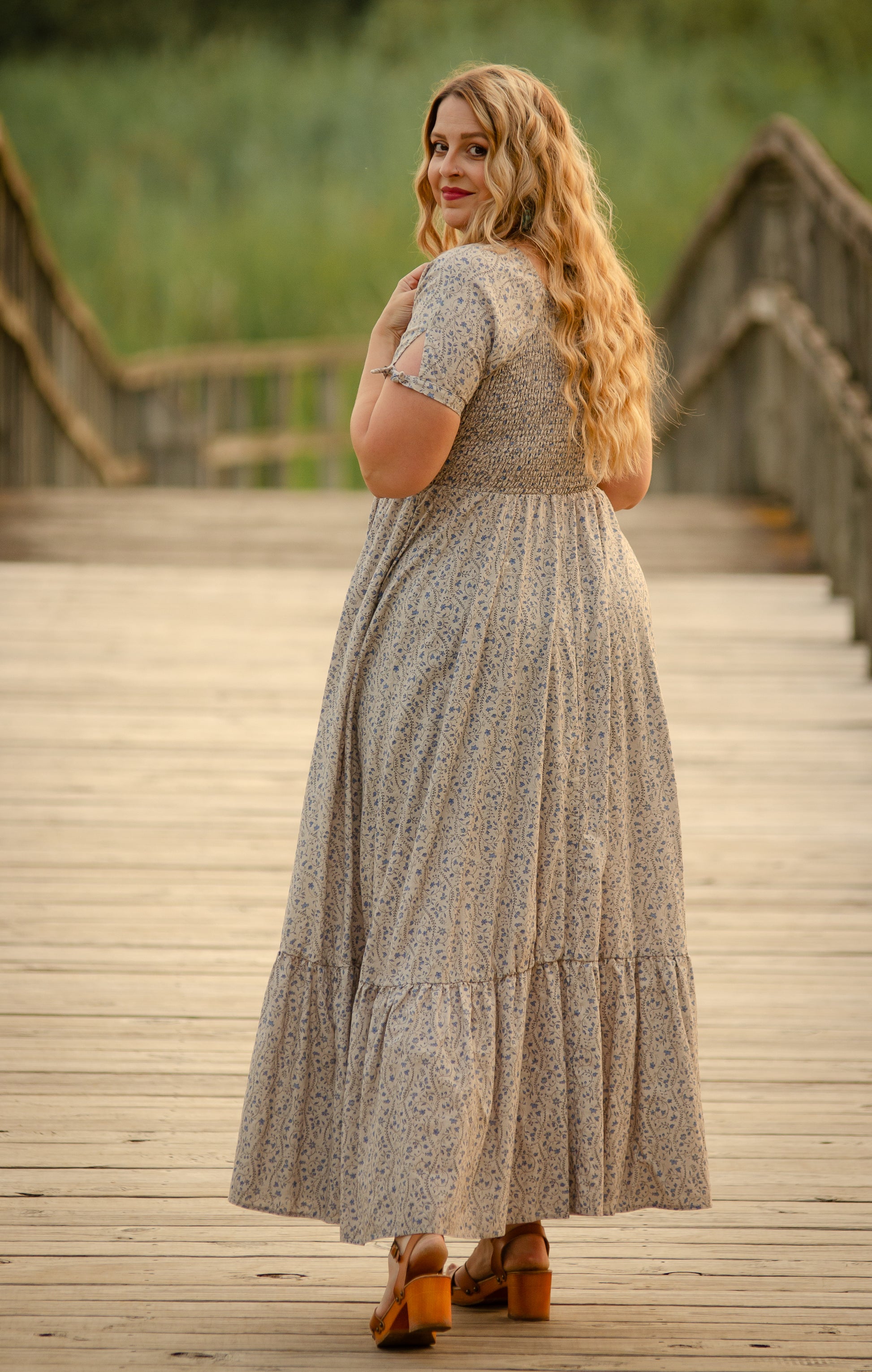 woman in patterned modest nursing dress